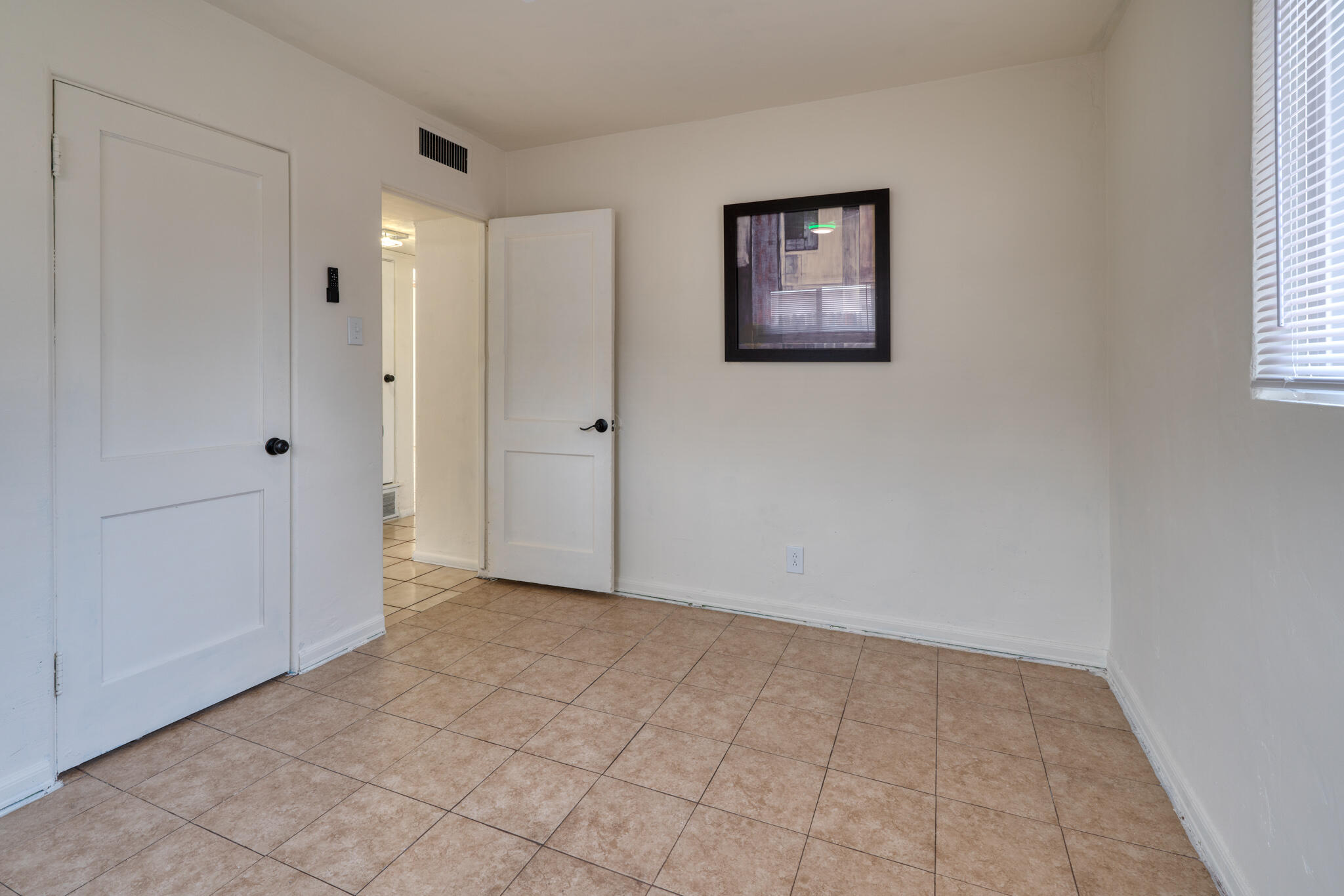 7611 APACHE Avenue NE