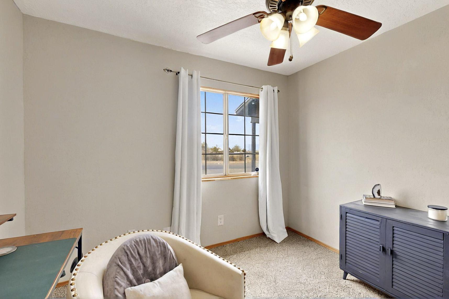 404 PECOS Loop SE