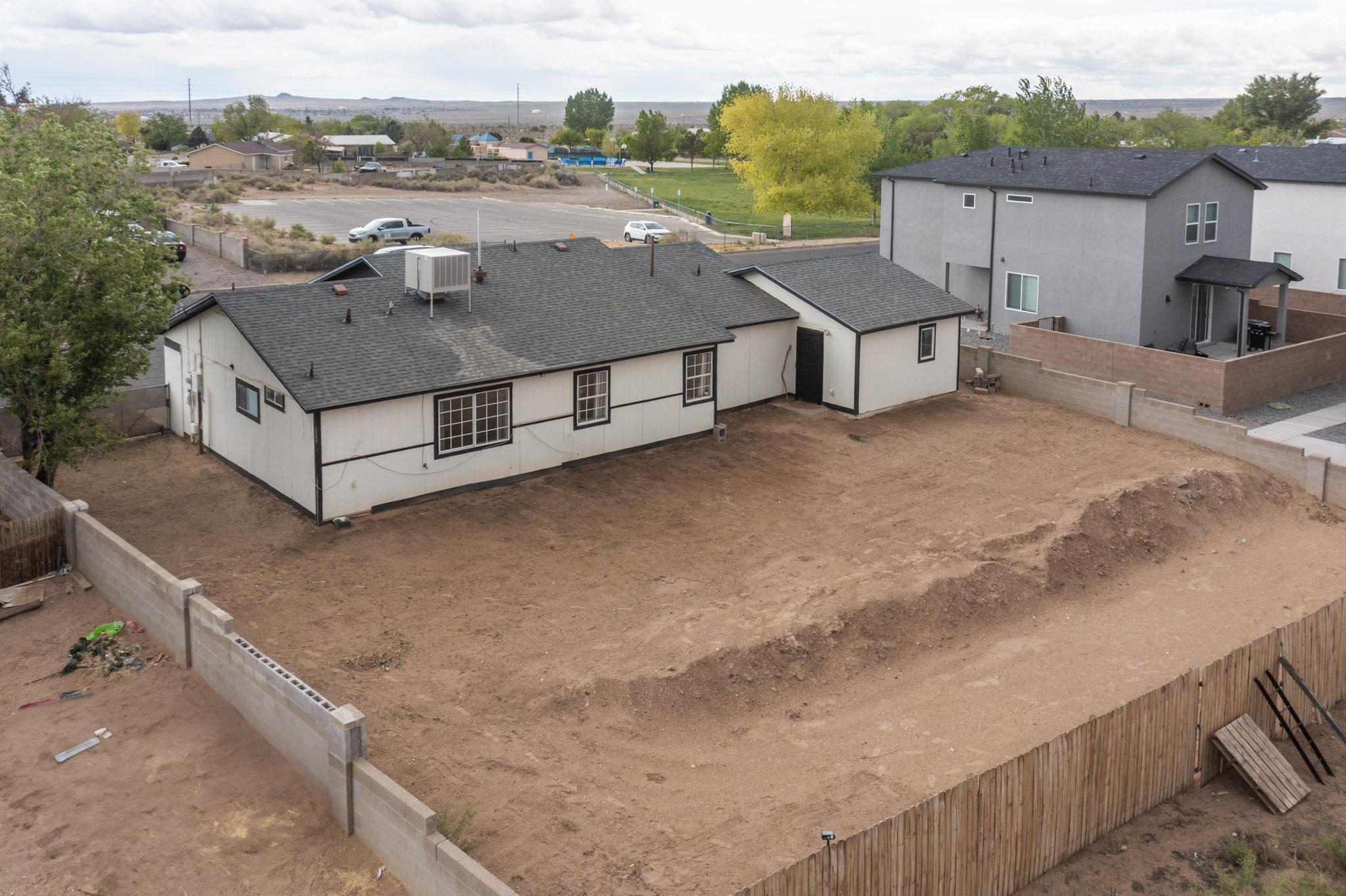 404 PECOS Loop SE