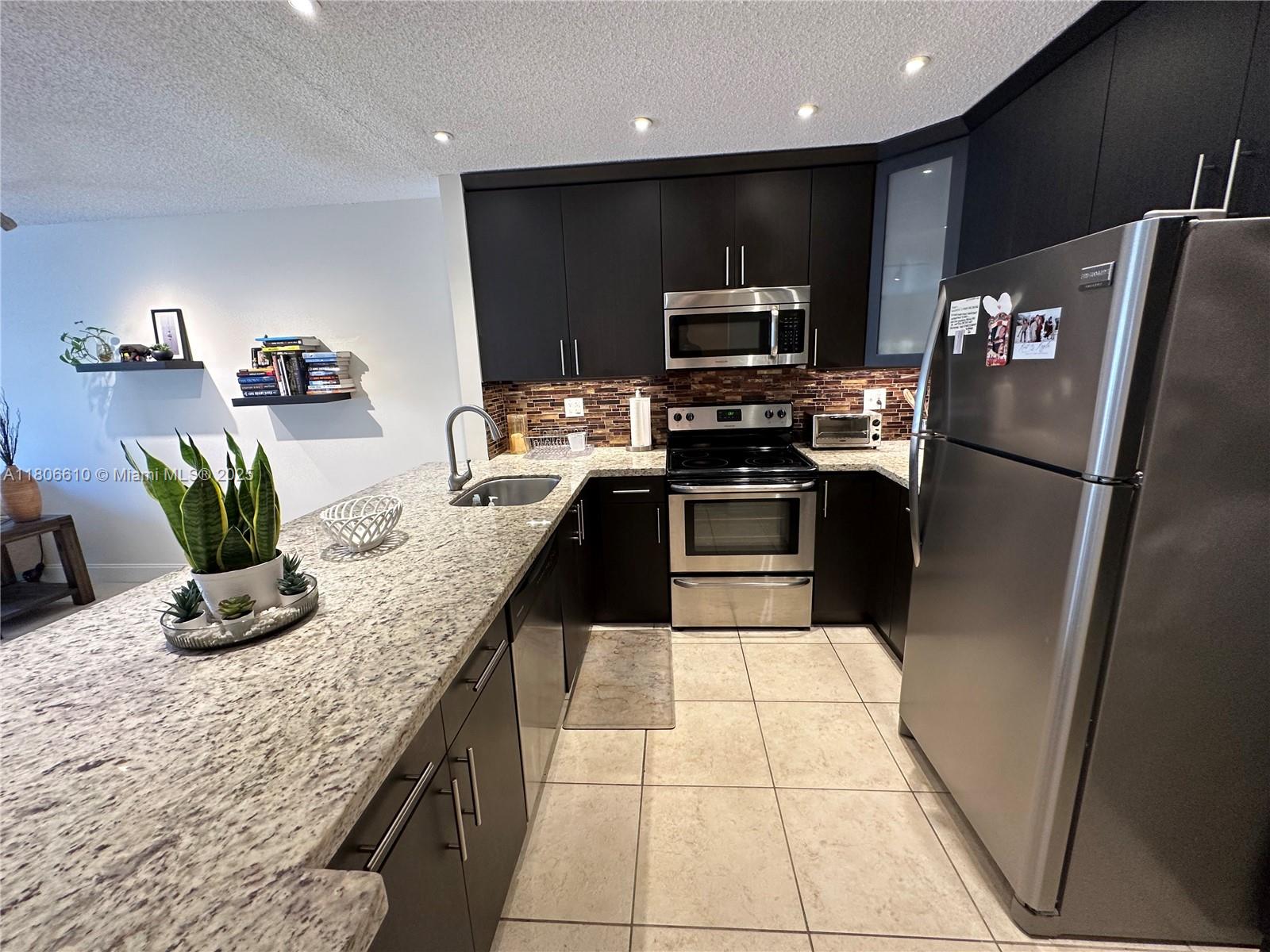 7740 Camino Real # 205 Unit: G-205