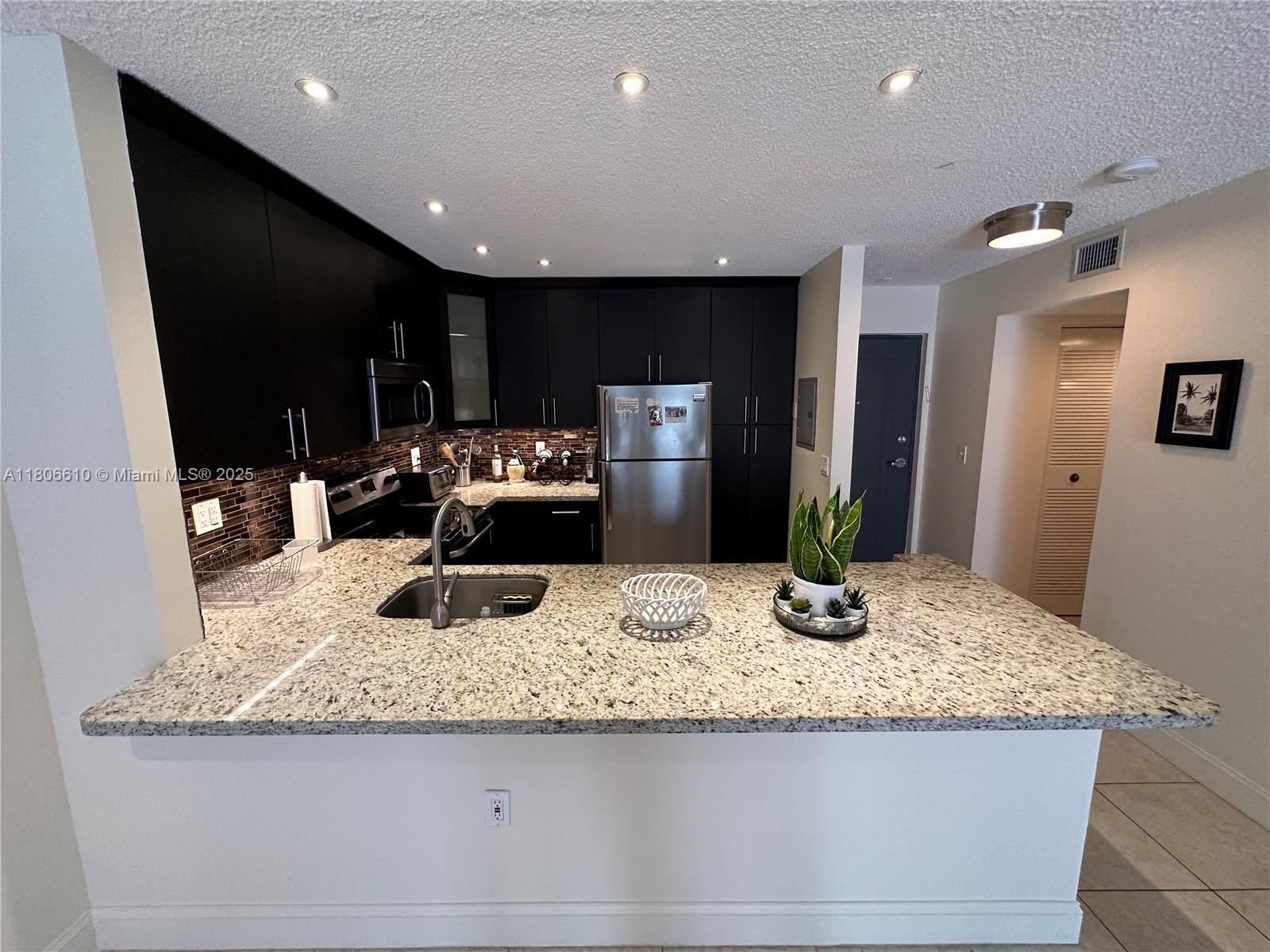 7740 Camino Real # 205 Unit: G-205