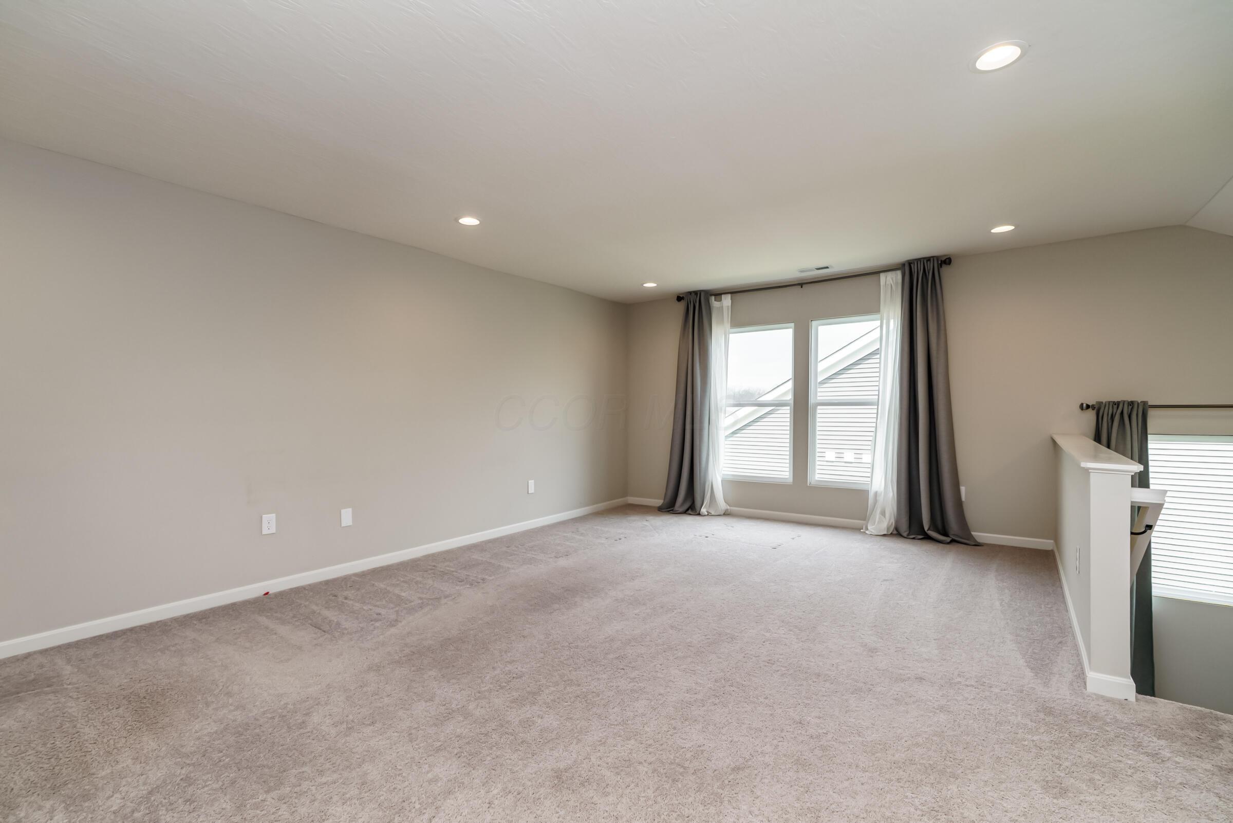 6090 Windcliff Drive E