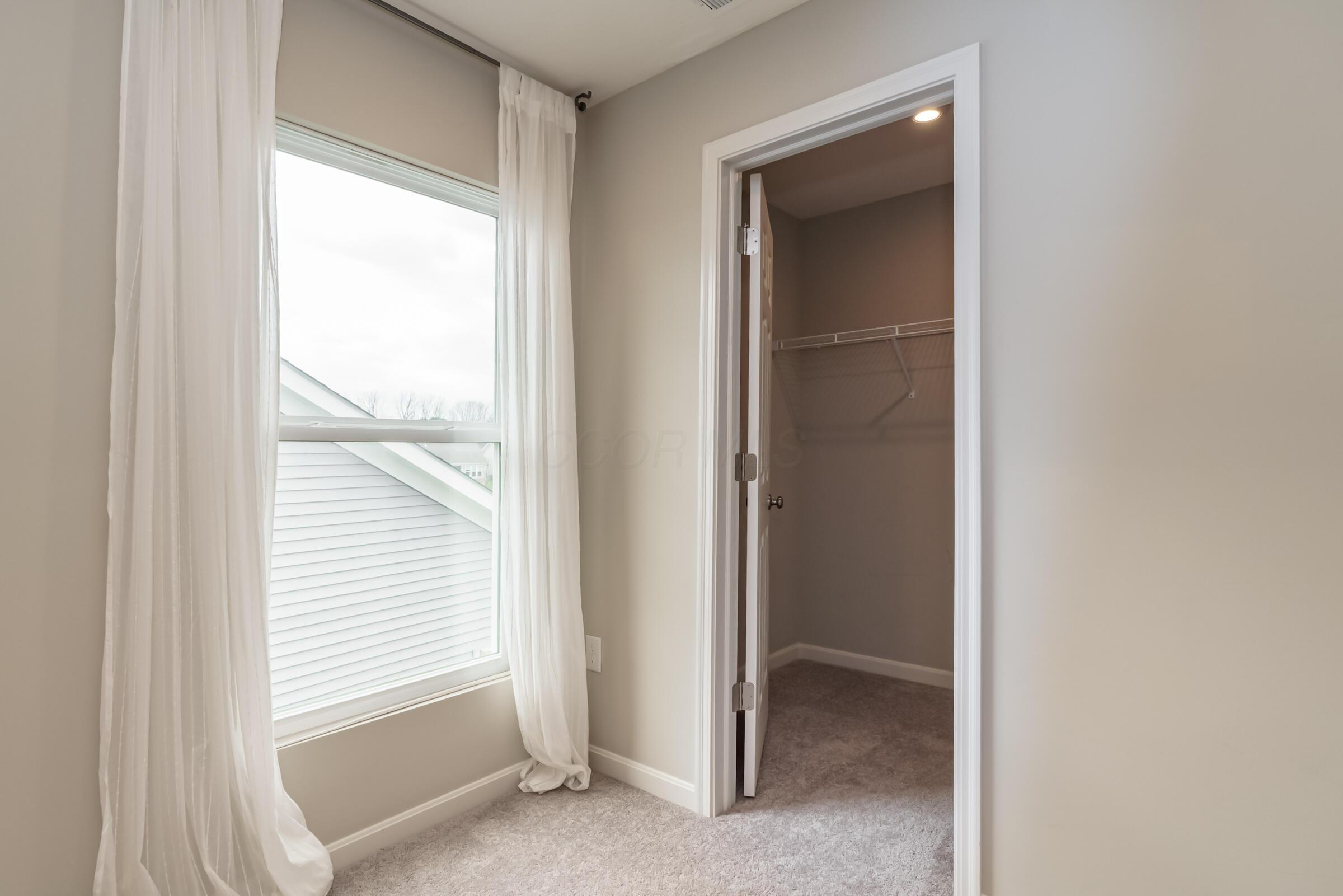 6090 Windcliff Drive E