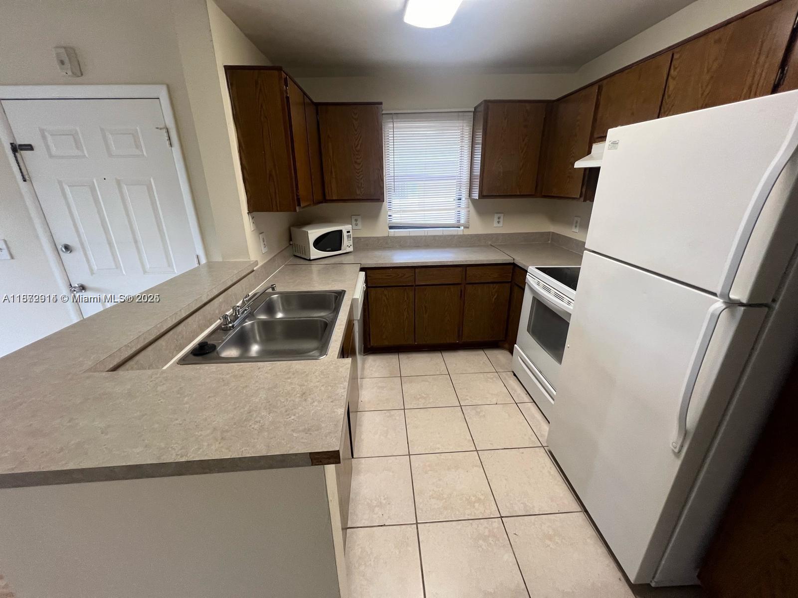 4088 N Pine Island Rd # 413