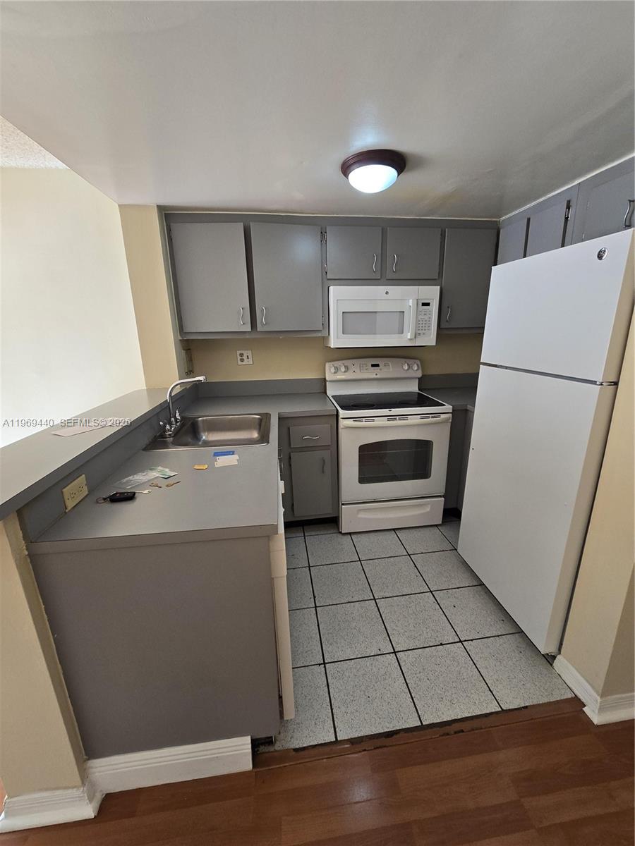 670 NW 85th Pl # 210 Unit: 11-210