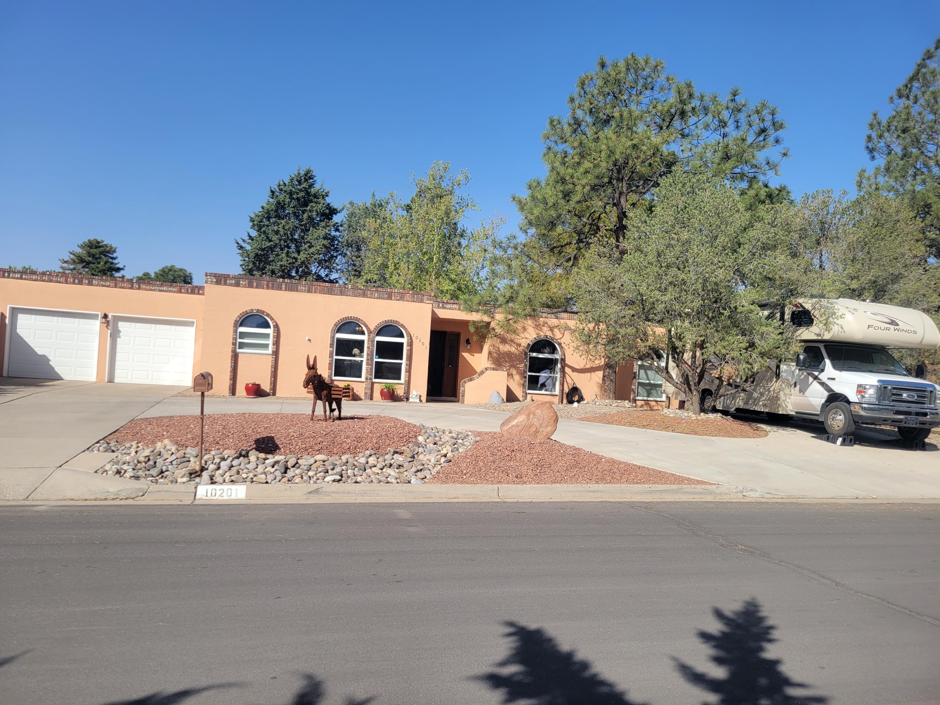 10201 KEEPING Drive NW