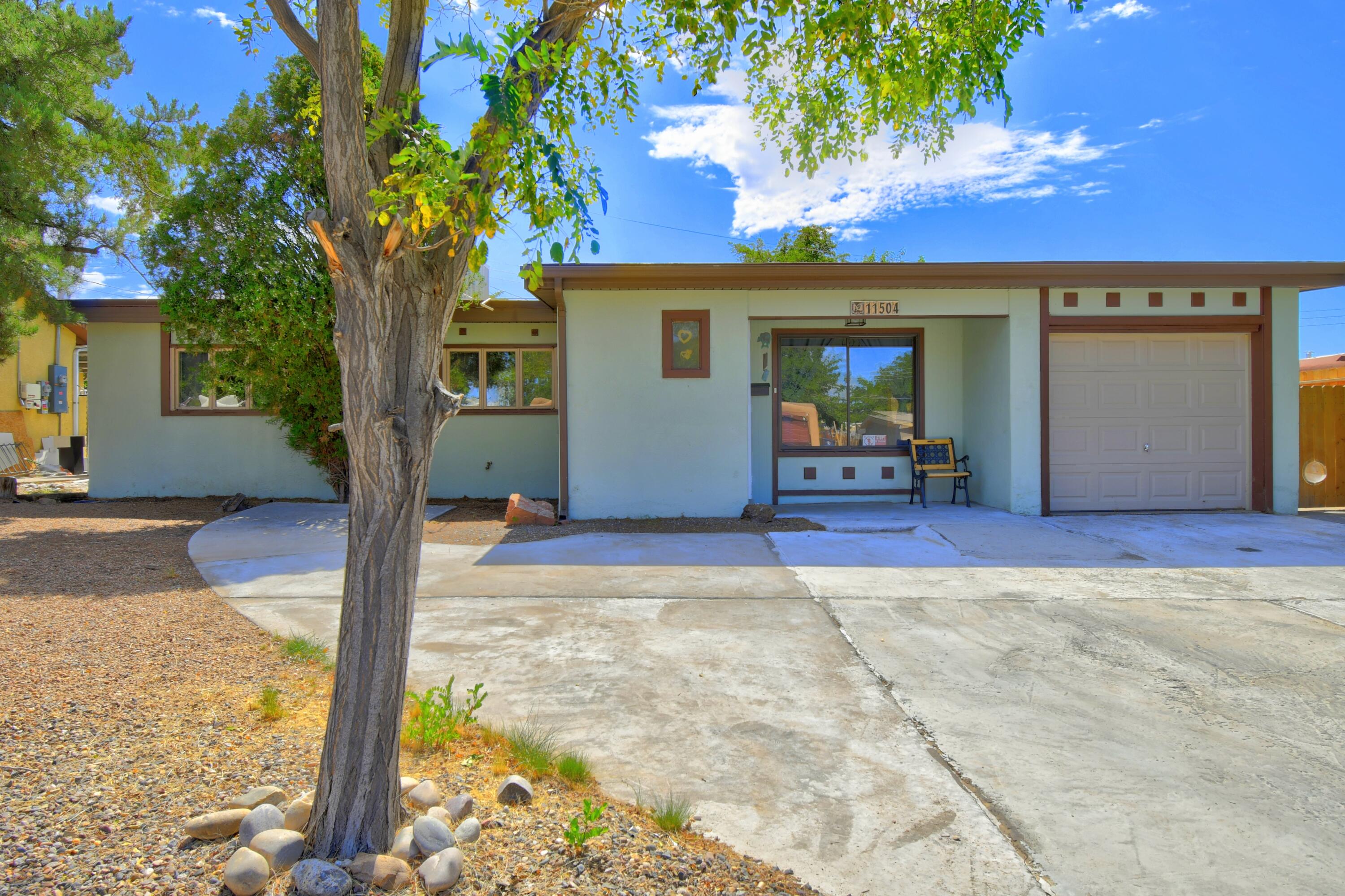 11504 ANGELINA Place NE