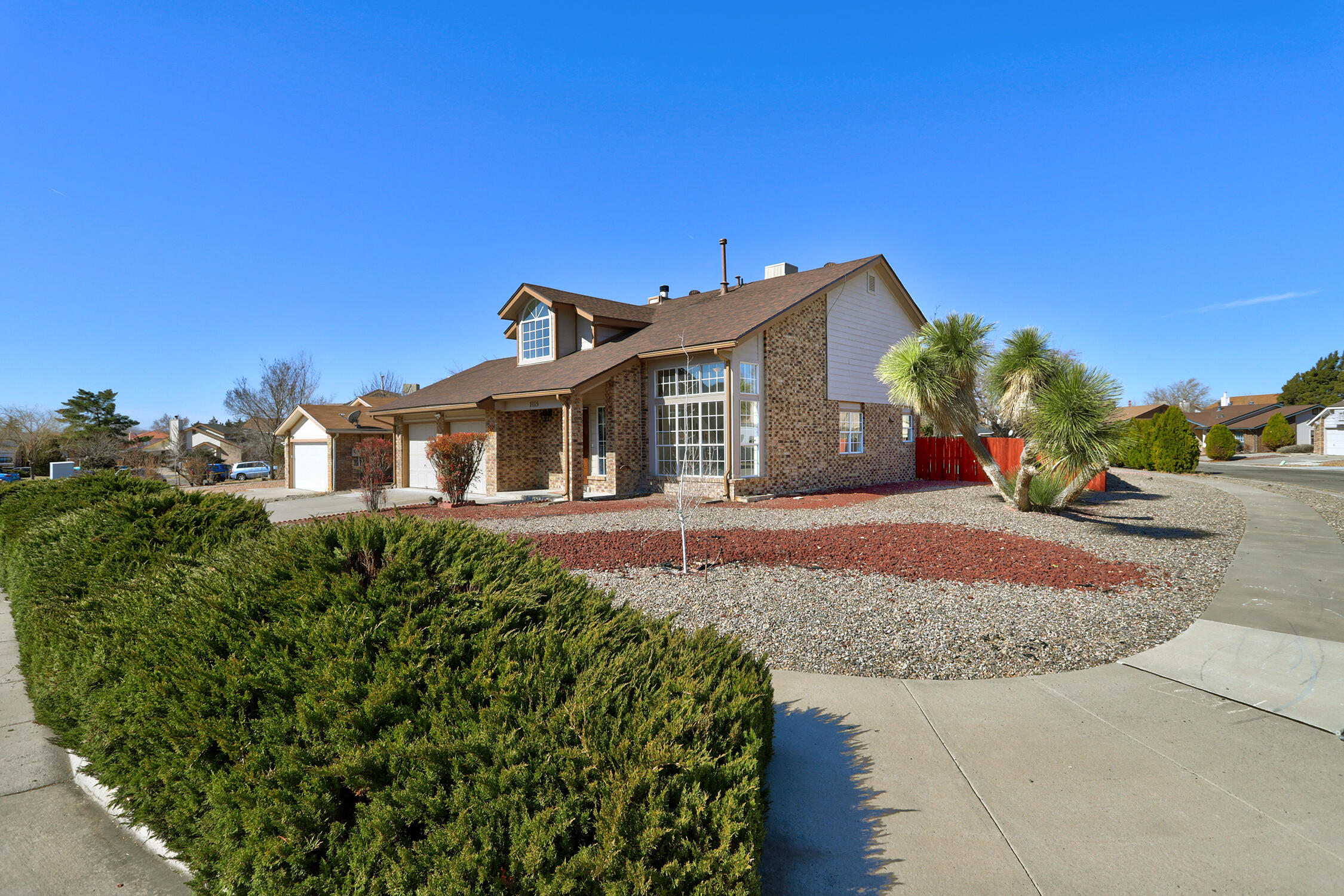 7115 PORTULACA Drive NW