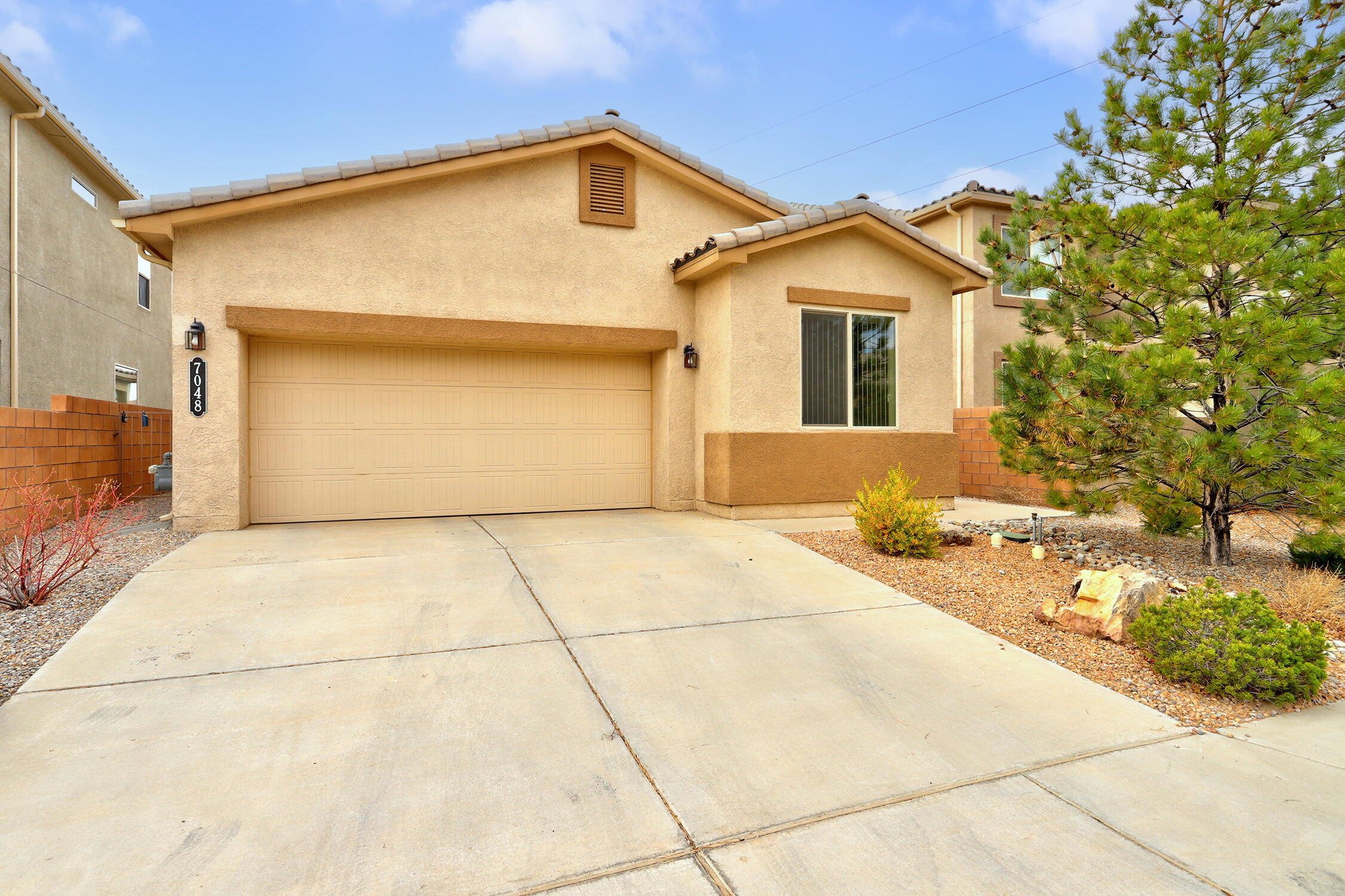 7048 TOMBSTONE Road NW