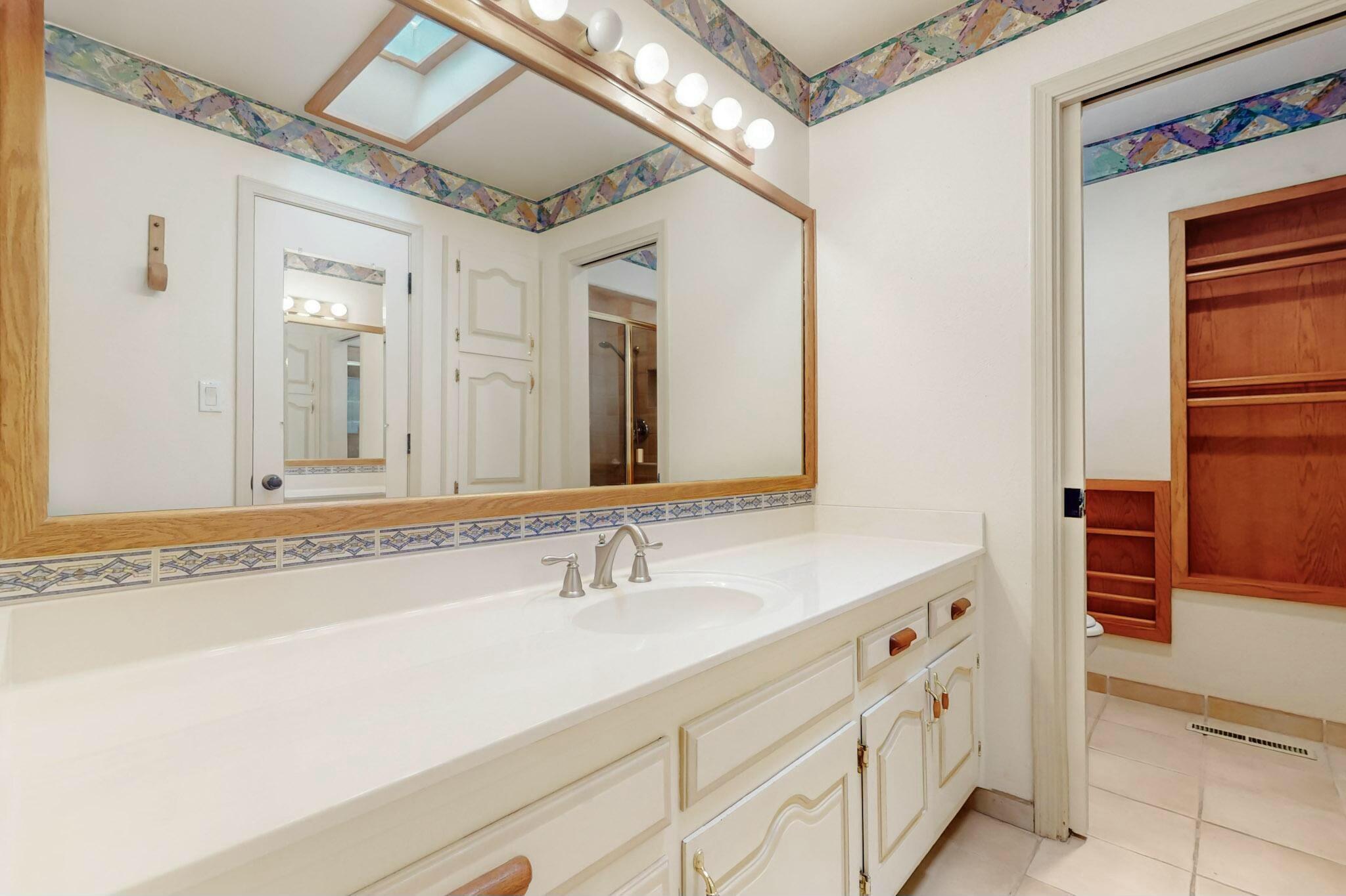 7827 ACADEMY Trail NE