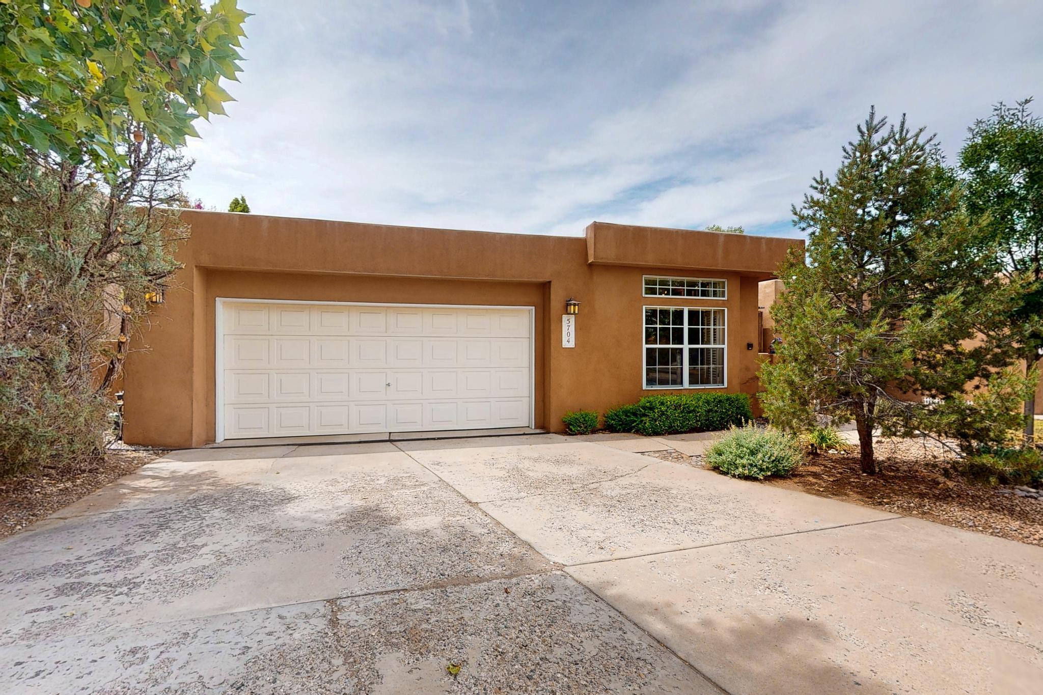 5704 PEPPERTREE Place NE