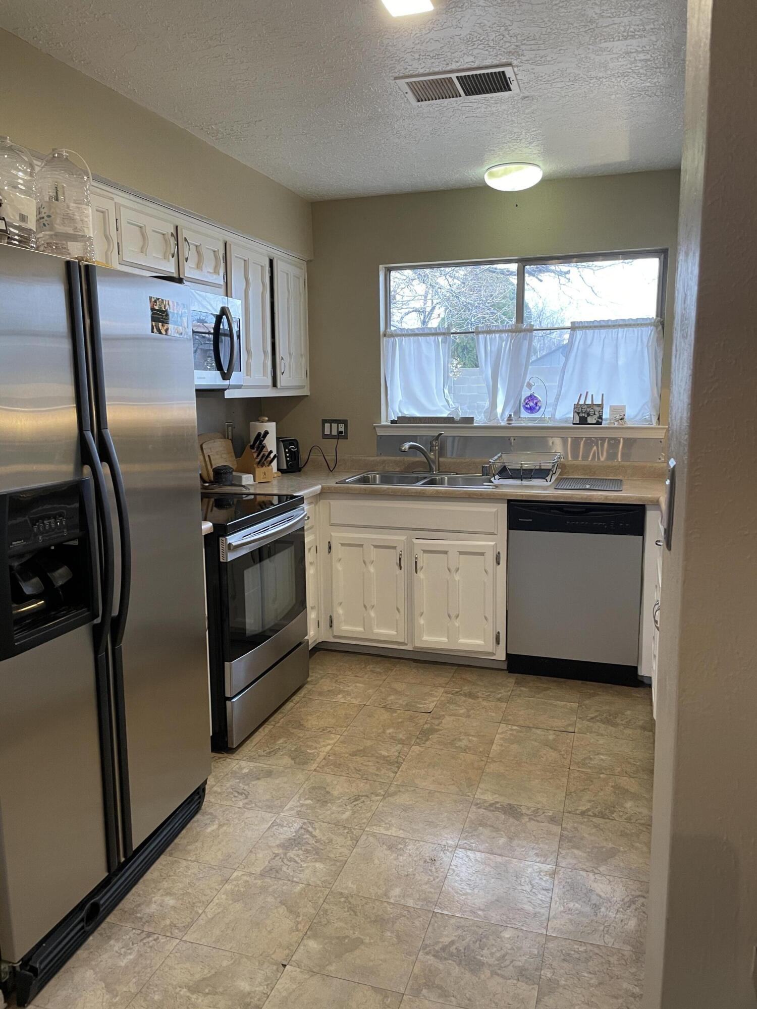 9704 AVENIDA DE LA LUNA NE
