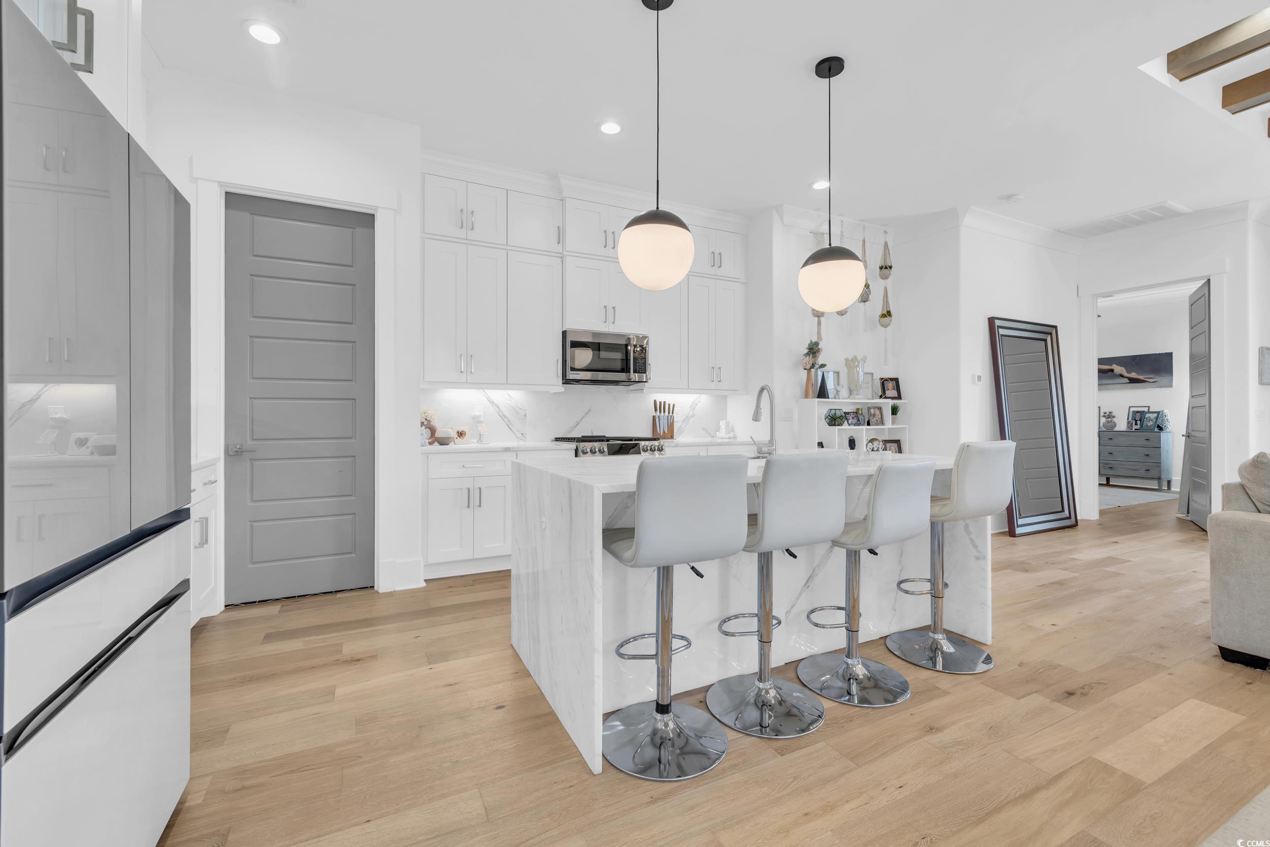 6774 Ocean Breeze Loop
