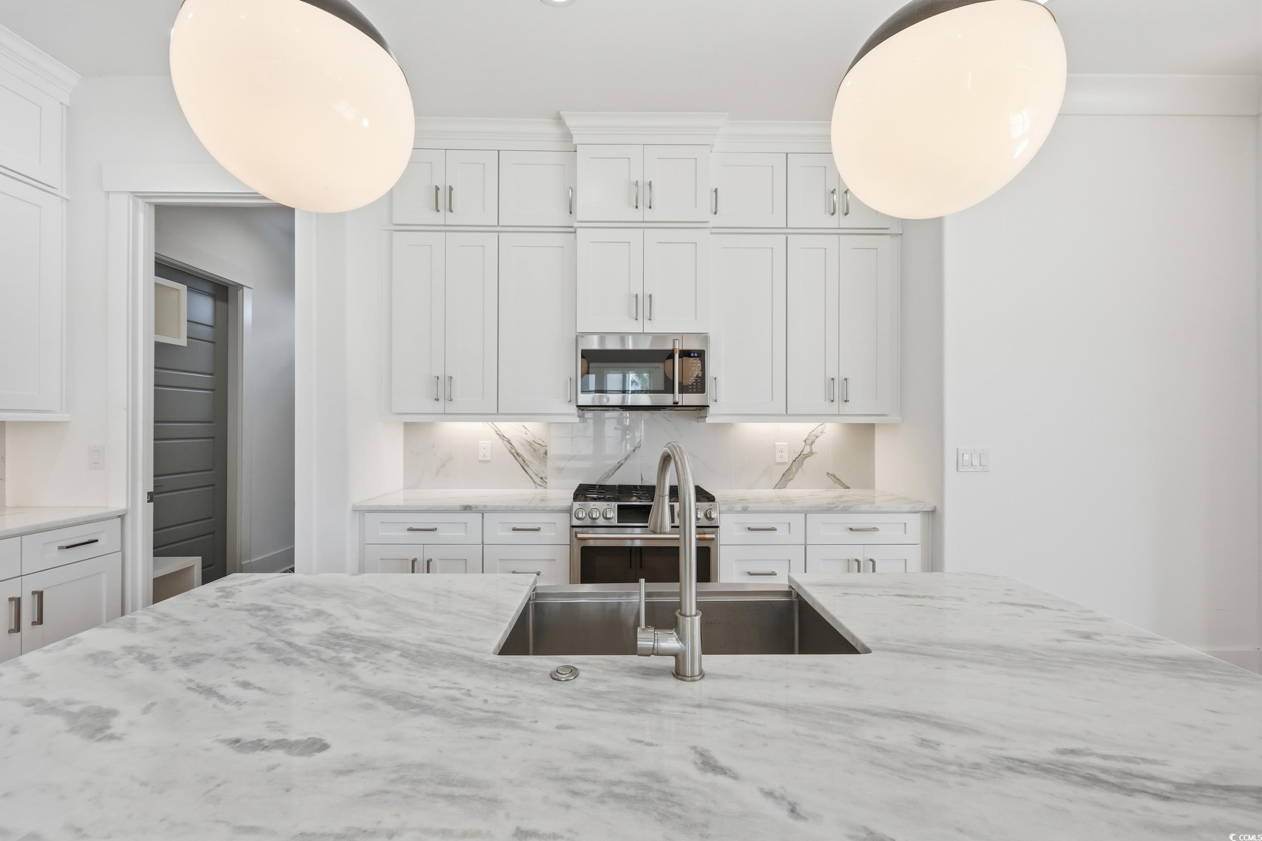 6774 Ocean Breeze Loop