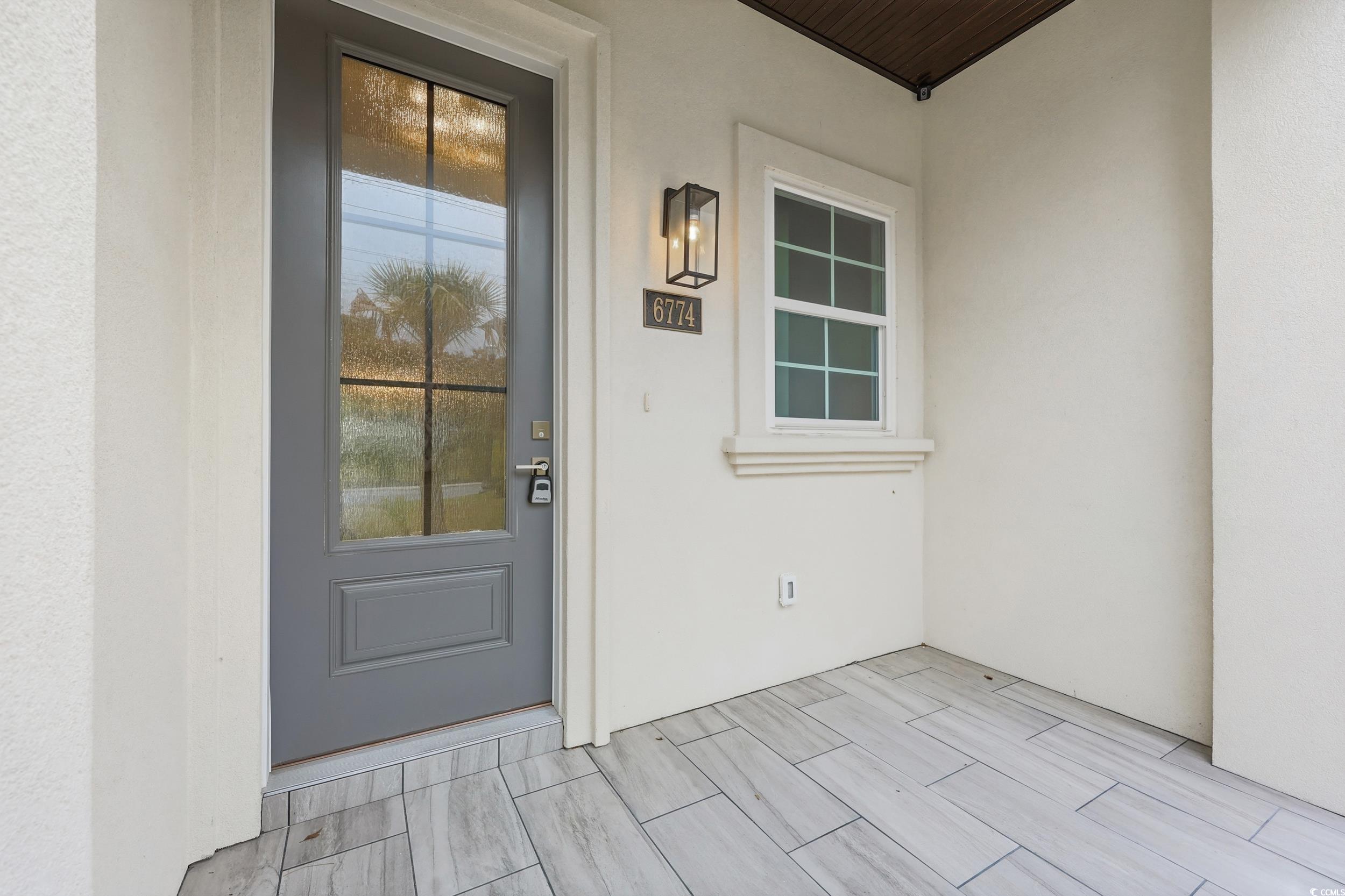 6774 Ocean Breeze Loop