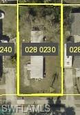 Aerial parcel map with a property outlined in yellow.