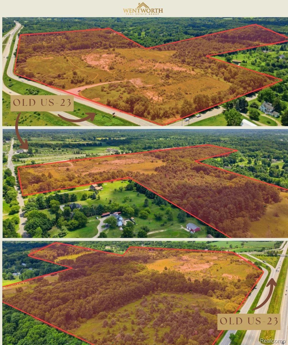Aerial views of wooded vacant land with open clearings and frontage along Old US-23.