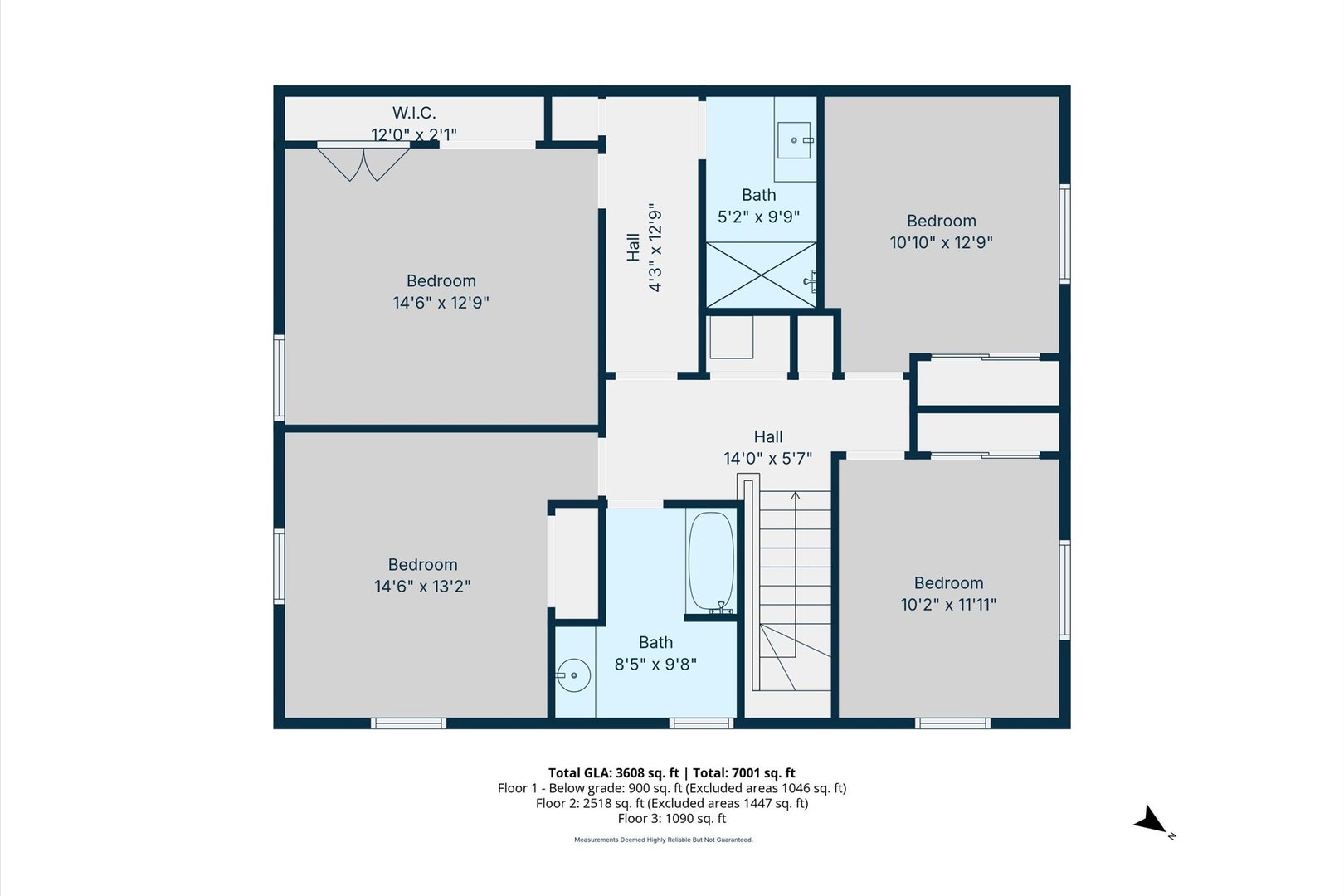 Floor plan showing four bedrooms, two bathrooms, a walk-in closet, halls, and a staircase.