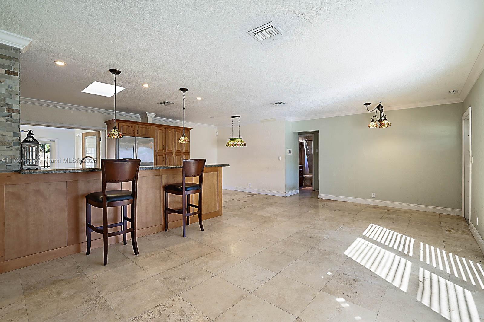 6593 SW 10th Ct