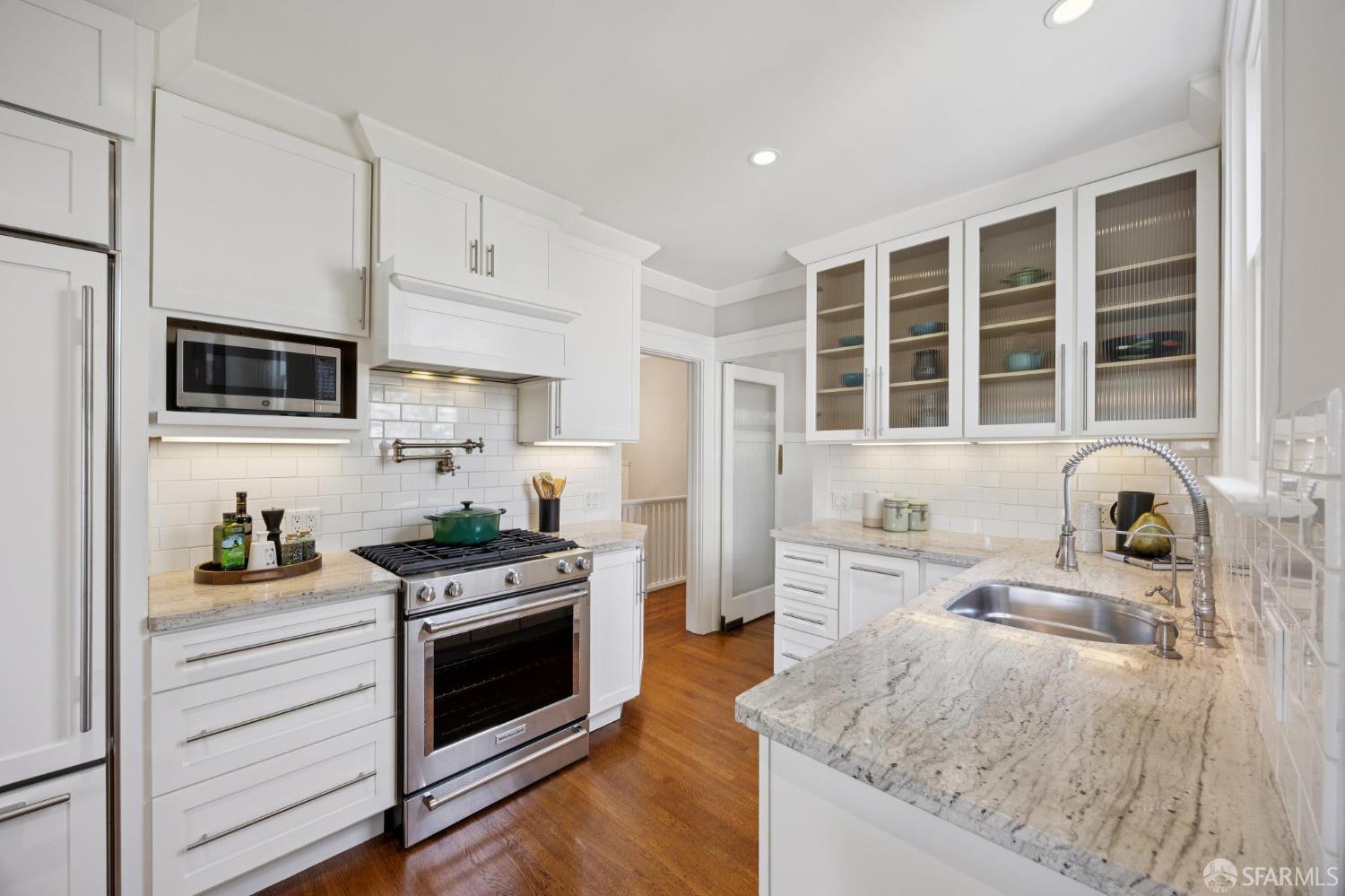 8 Offers!  37% Over Asking! Stunning Cole Valley Condo w/ Edwardian Charm!