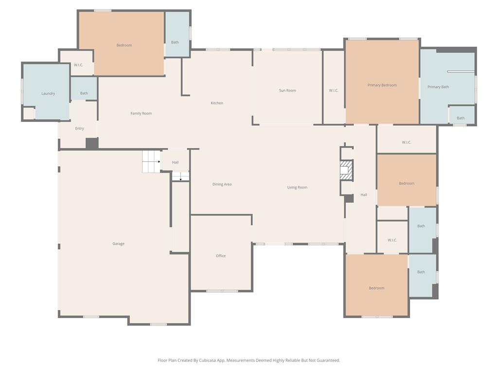 Floor plan showing four bedrooms, multiple bathrooms, living spaces, an office, laundry room, and garage.