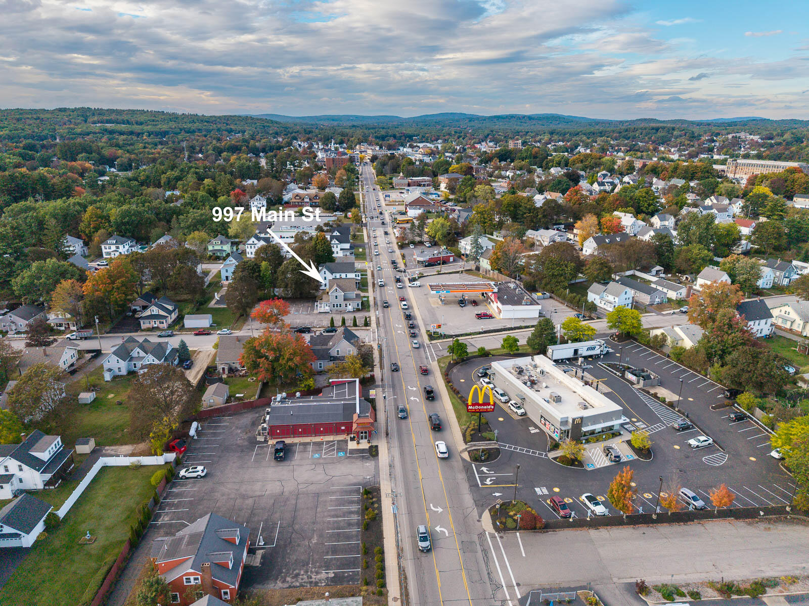 Aerial view of downtown Sanford along Main Street, with an arrow marking 997 Main St.