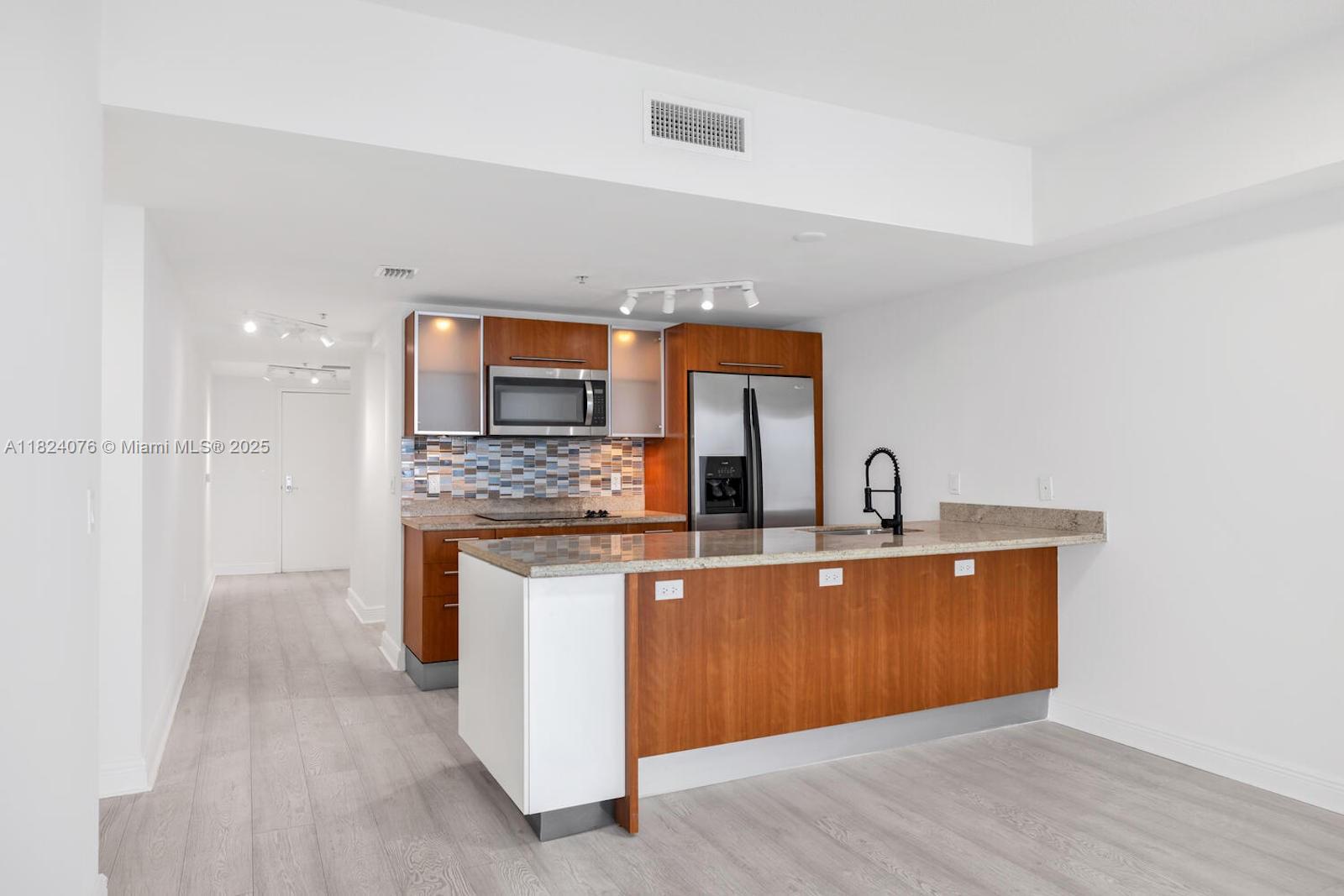 185 SW 7th St # 2703