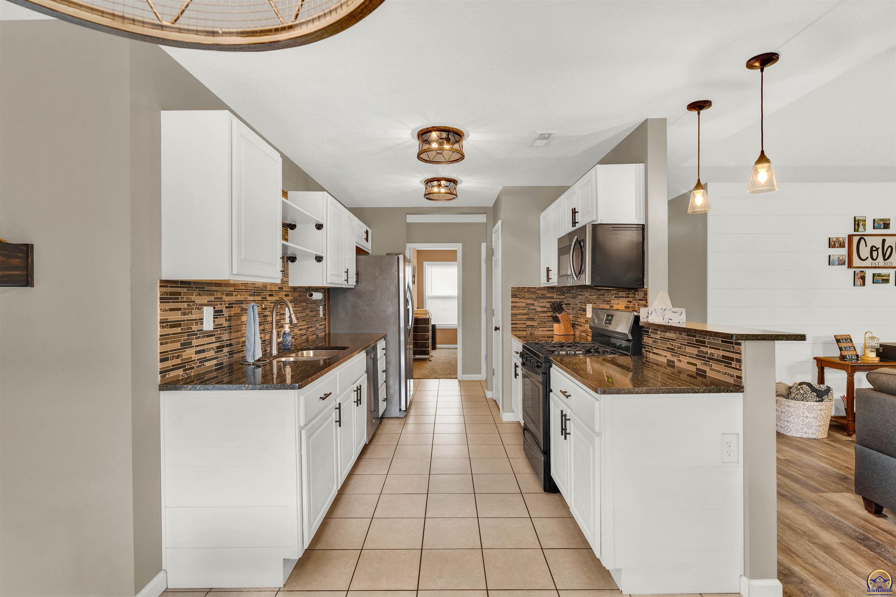 7015 SW Wheatfield LN