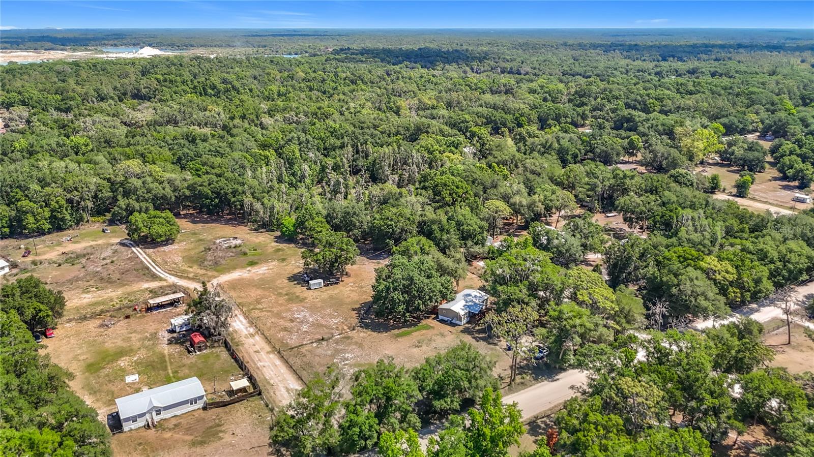 5 Acre Homestead Property in Zephyrhills FL | RV Parking + Pole Barn | Coldwell Banker AquaTerra