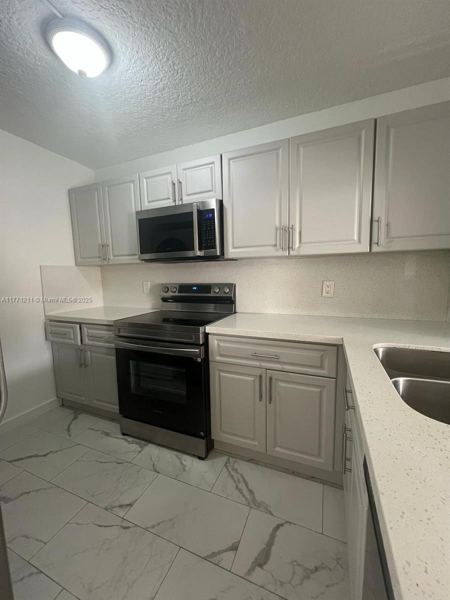 10054 Winding Lake Rd # 101