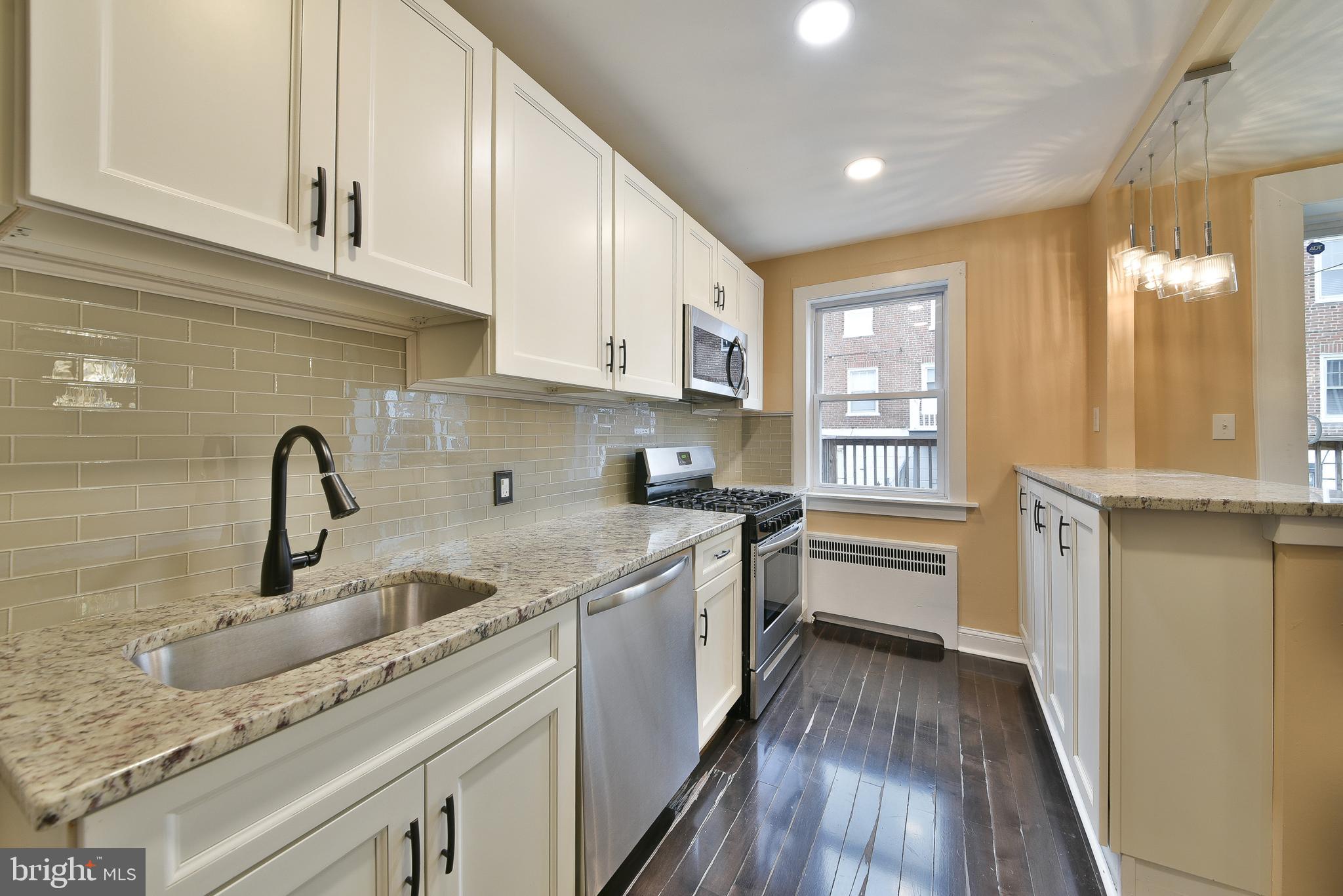 7537 WOOLSTON AVENUE