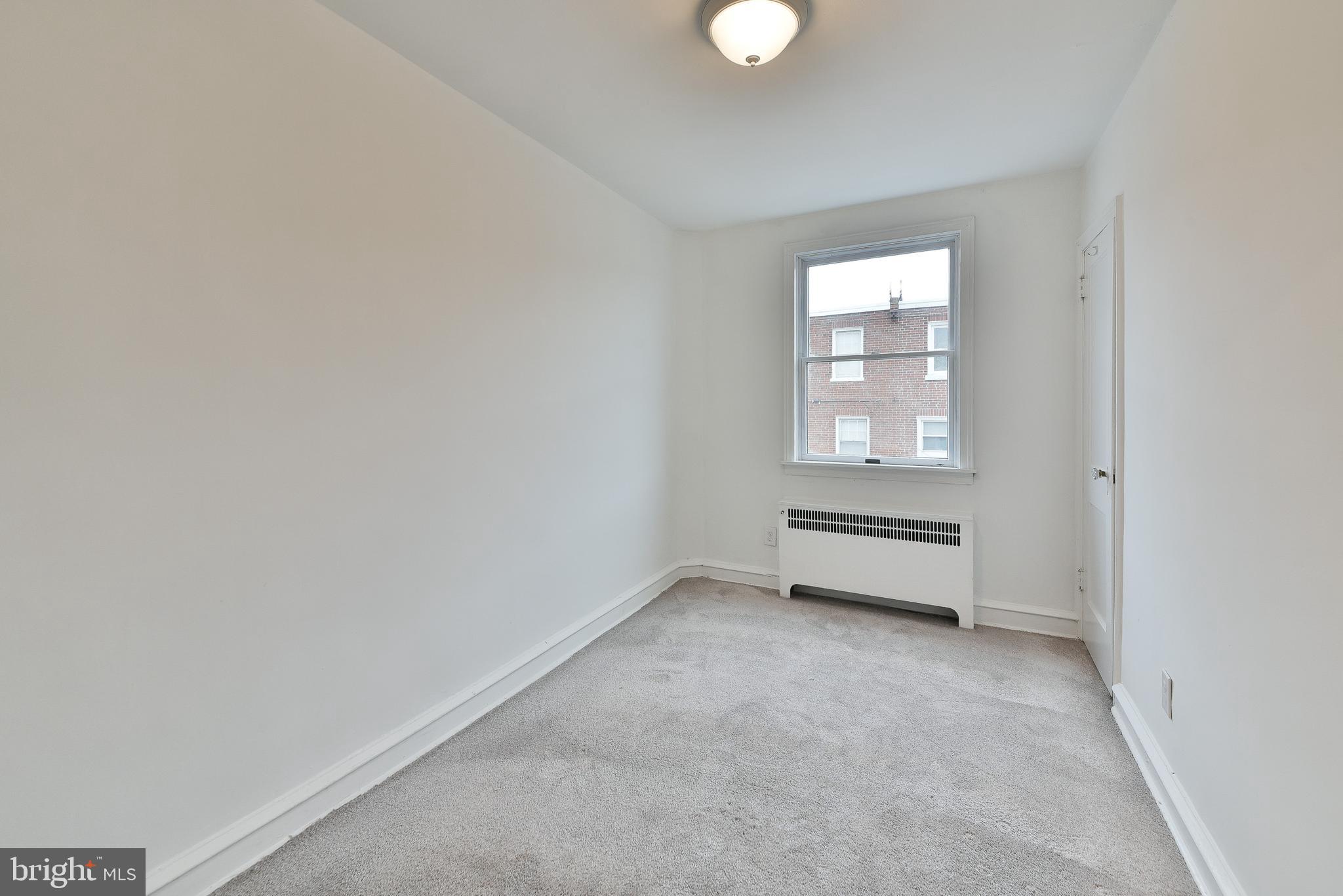 7537 WOOLSTON AVENUE