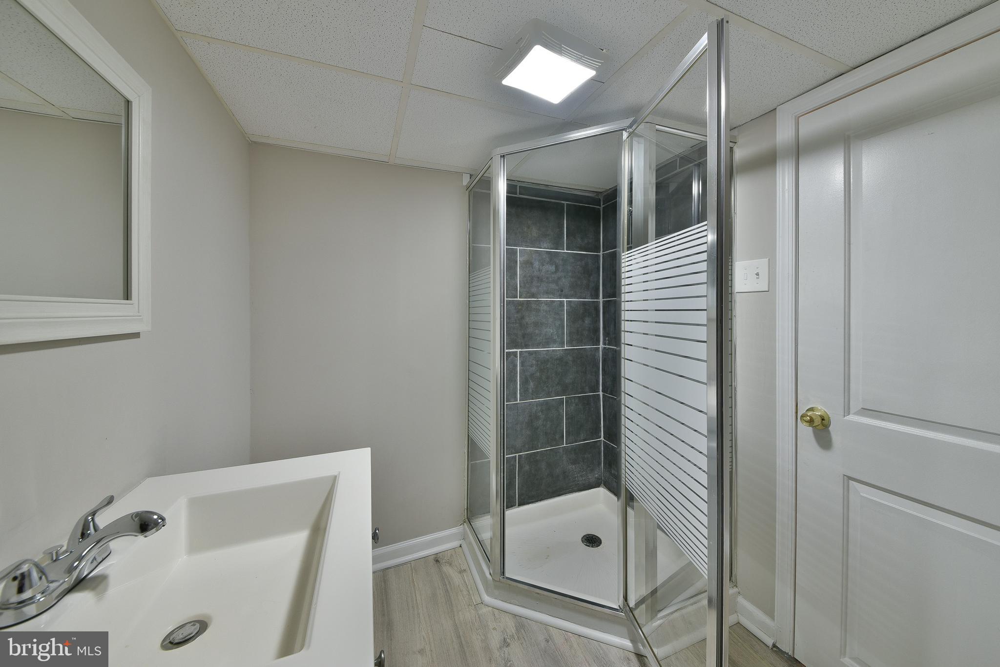 7537 WOOLSTON AVENUE