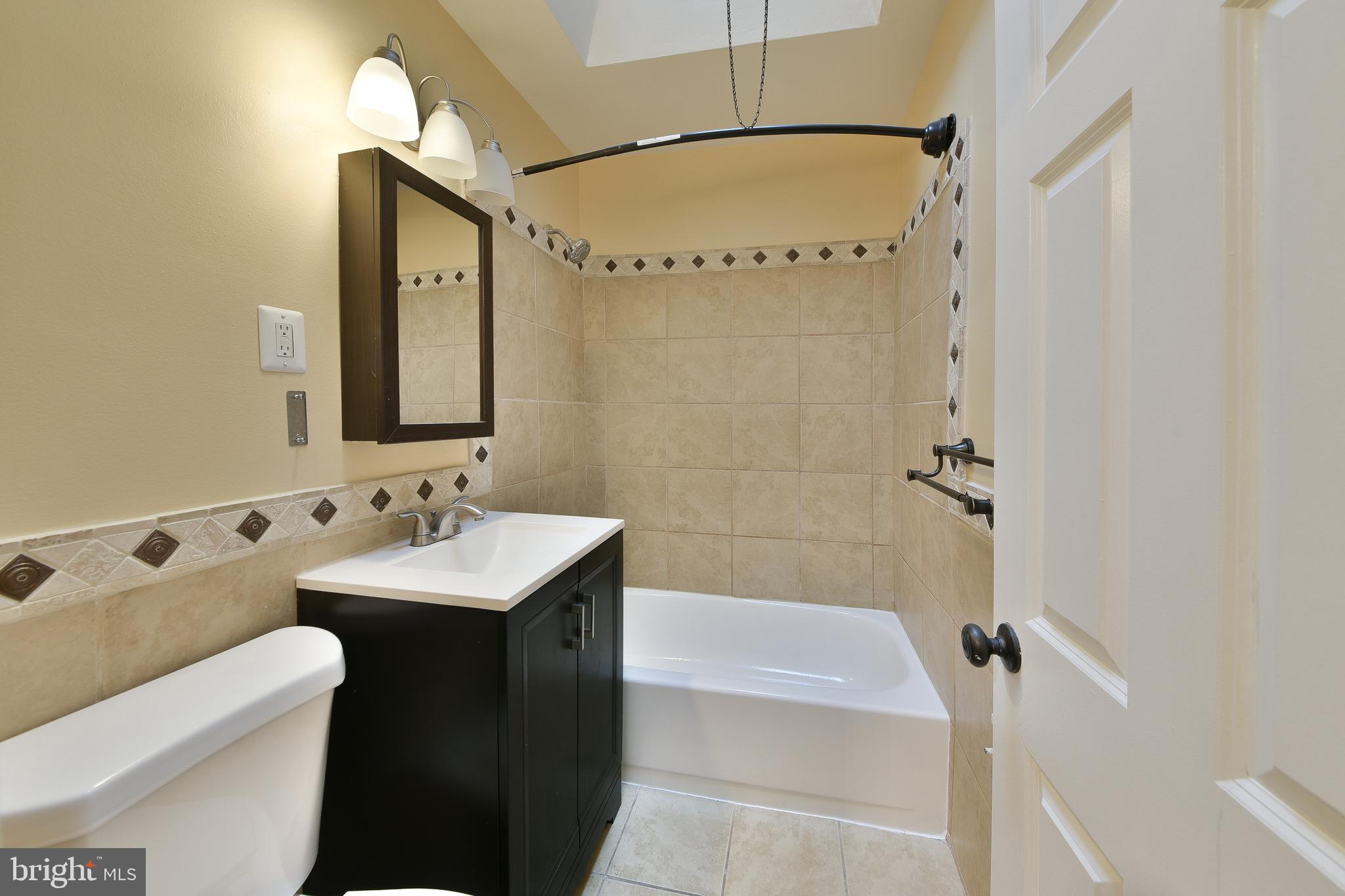 7537 WOOLSTON AVENUE