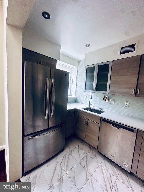 3831 NEWARK STREET NW Unit: F450