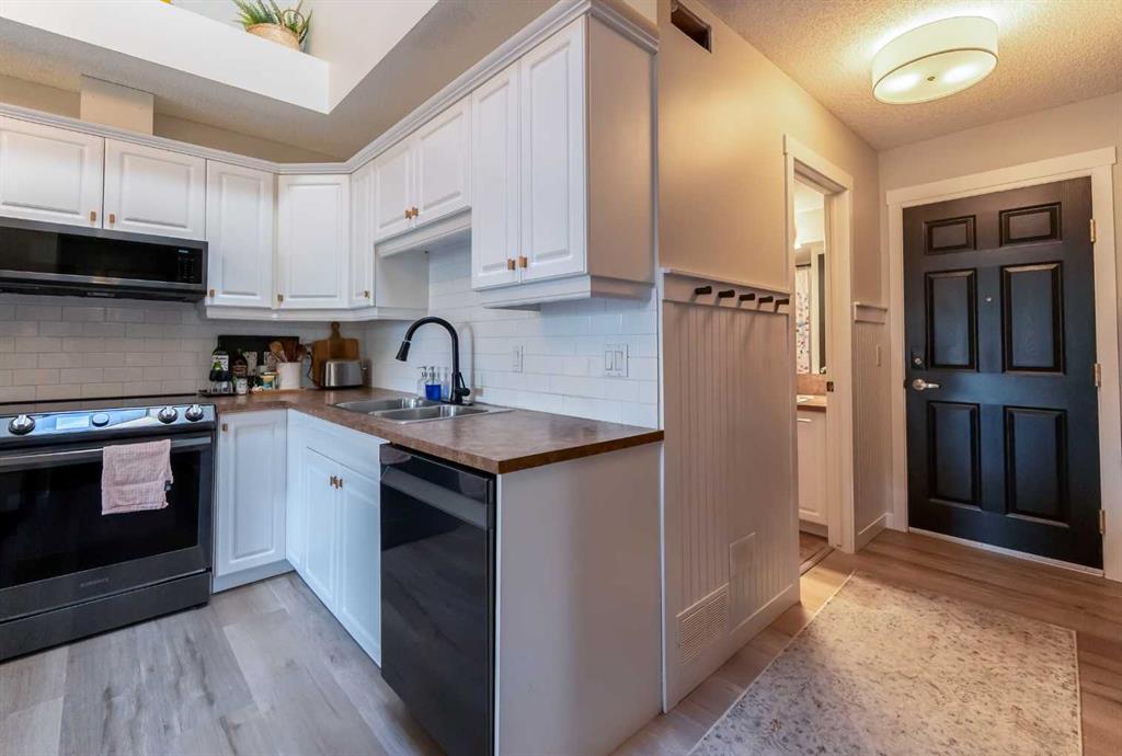 6148 Bowness Road NW Unit: 303