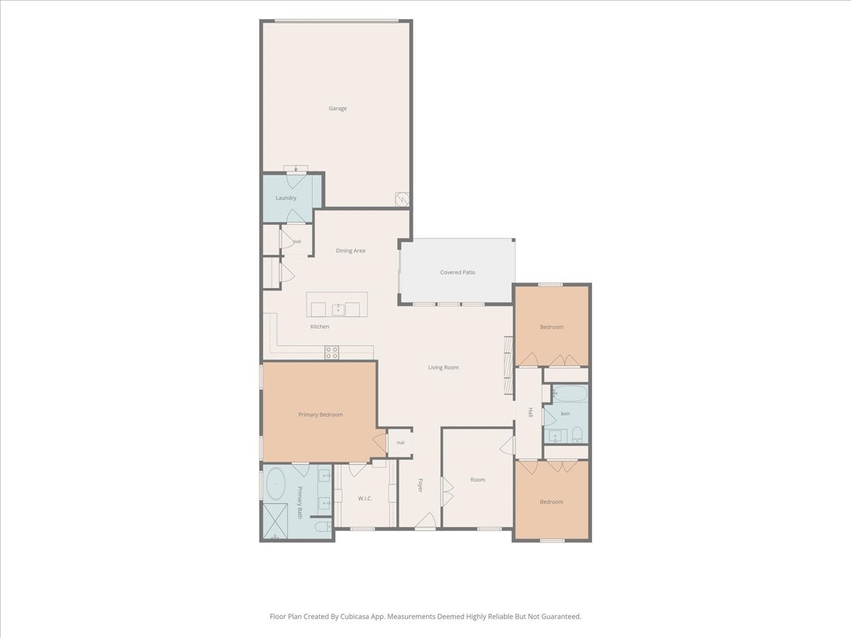 Floor plan with three bedrooms, a garage, covered patio, kitchen, and living room.