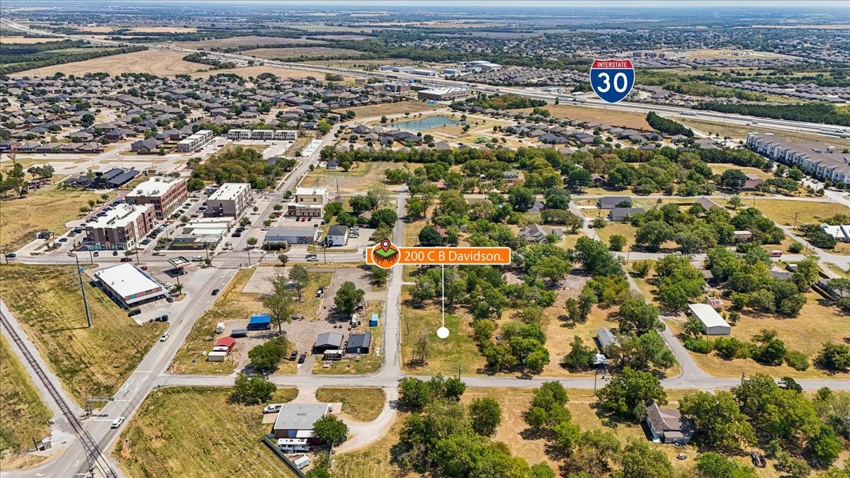 Aerial view of the marked property site near Interstate 30 in Fate, Texas.