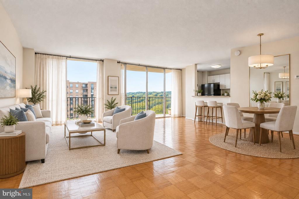 Furnished condo living room with parquet floors, floor-to-ceiling windows, and a view of green grounds.