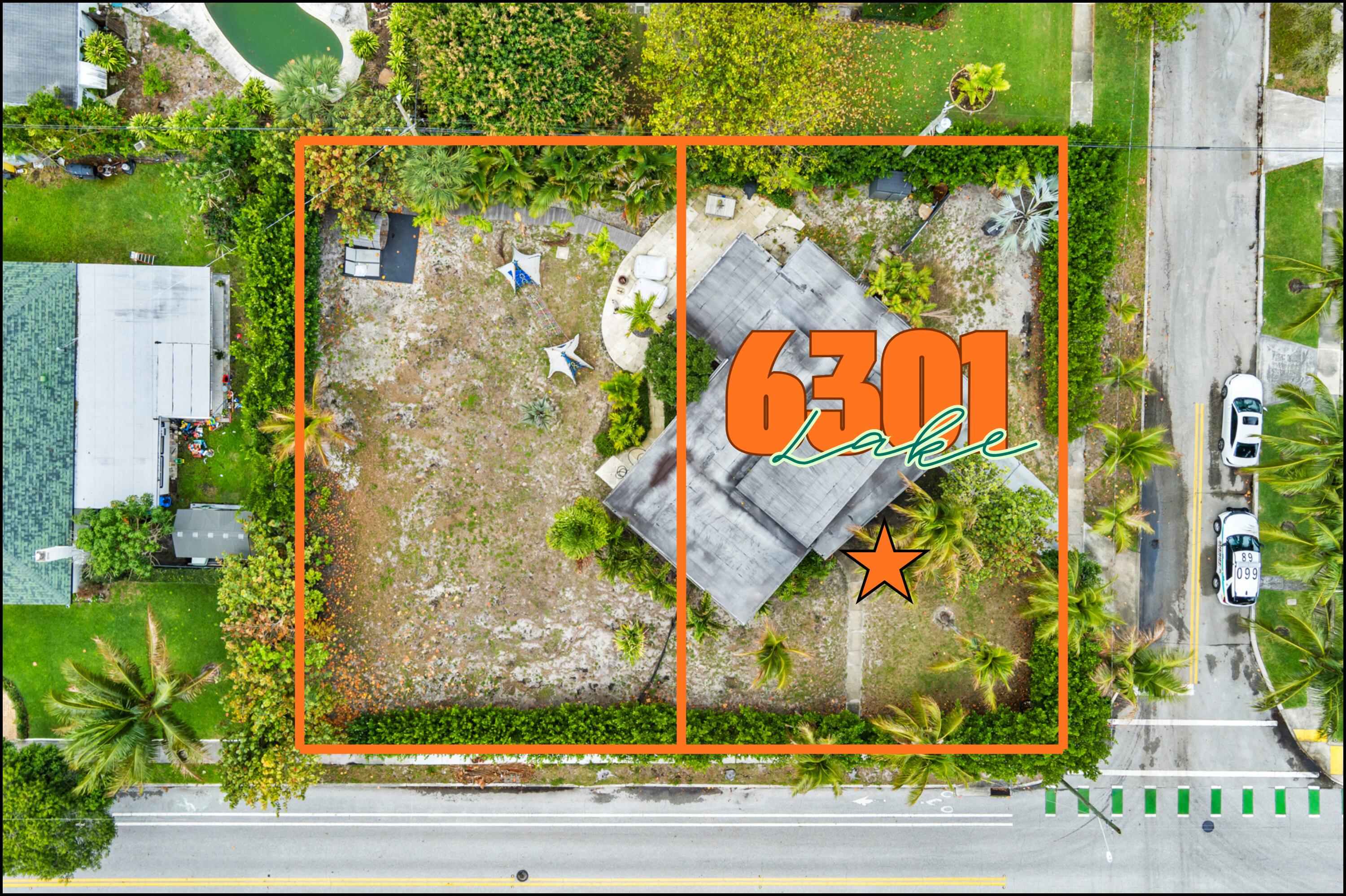 Aerial view of the 6301 Lake property, outlined in orange beside a palm-lined road.
