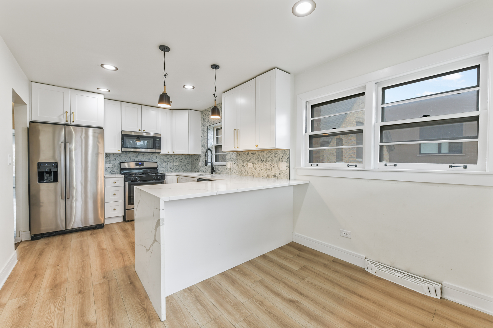 2735 N Mozart Avenue Unit: 1