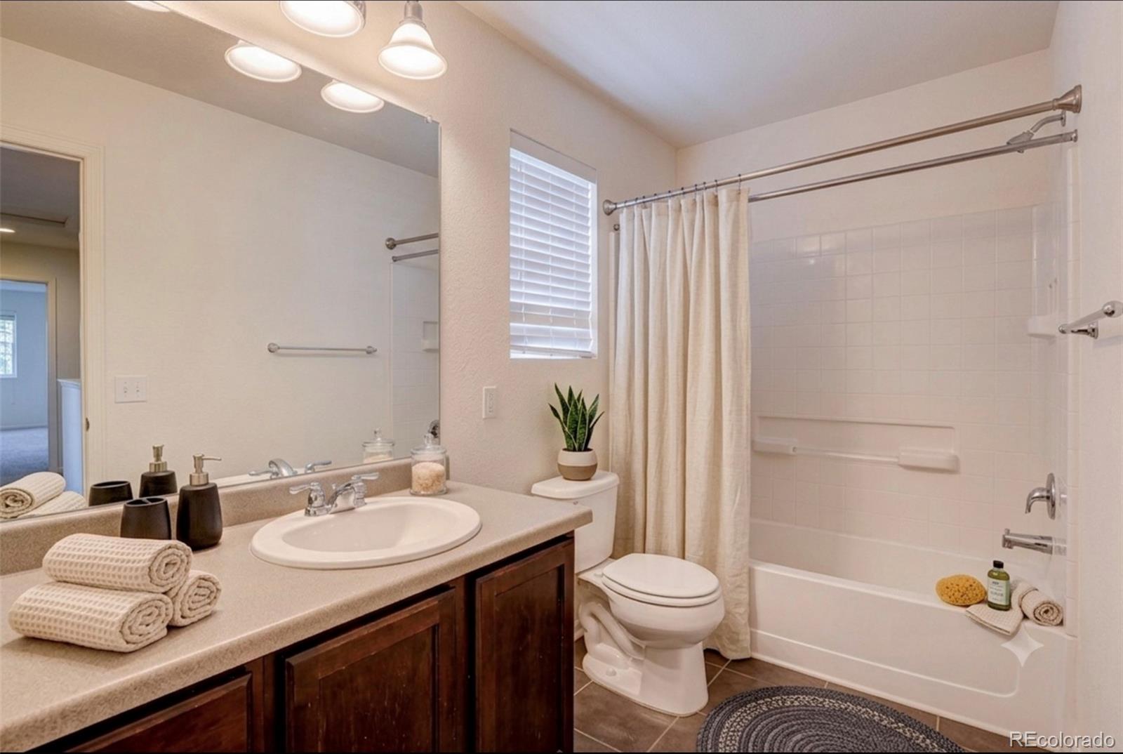 10771 E 28th Place