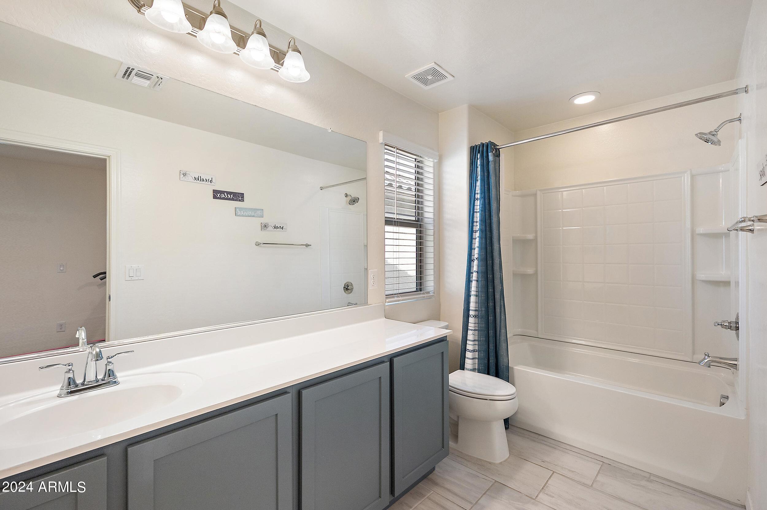 5807 W WARNER Street