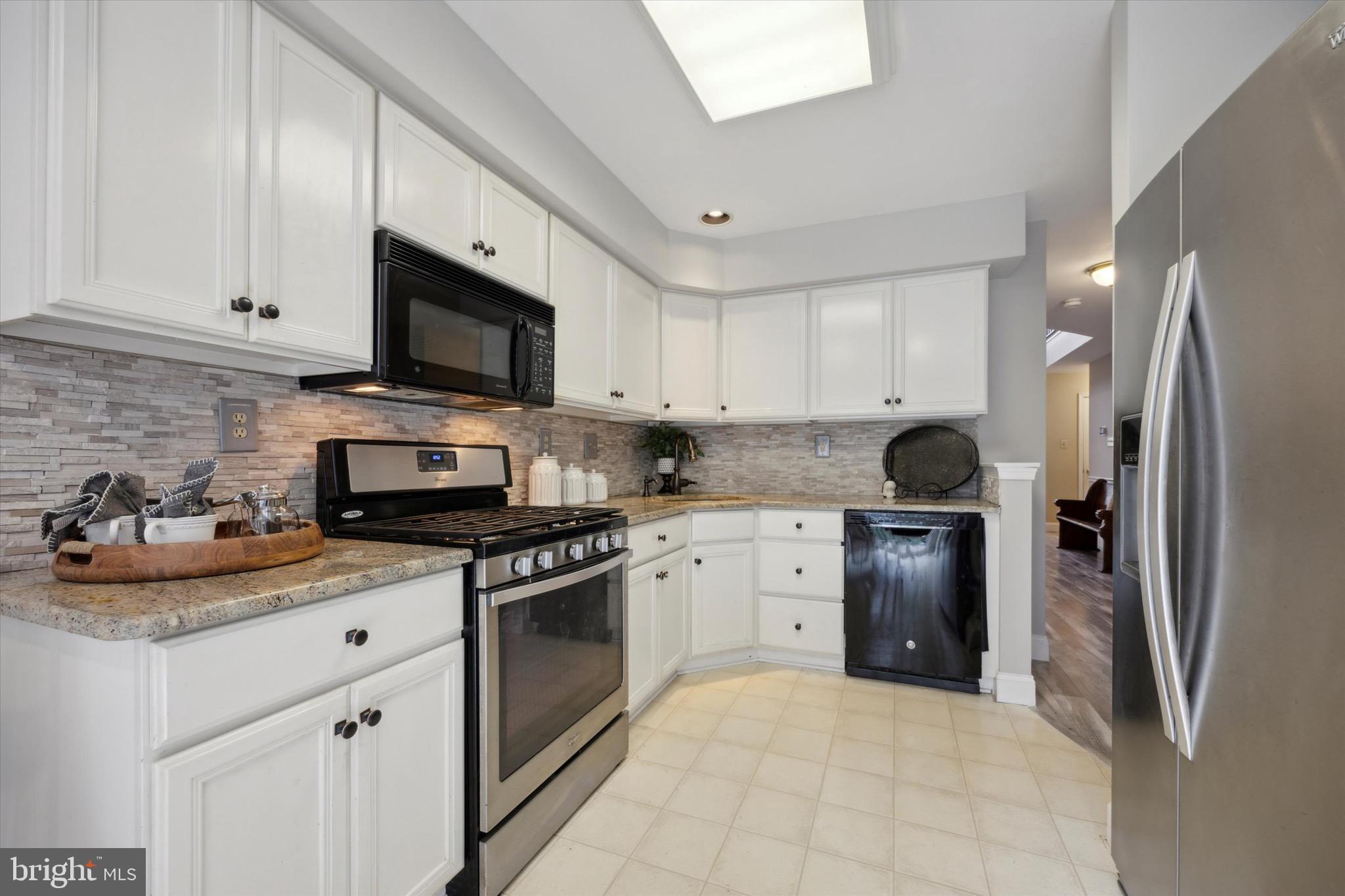 6002 Windsong Ct