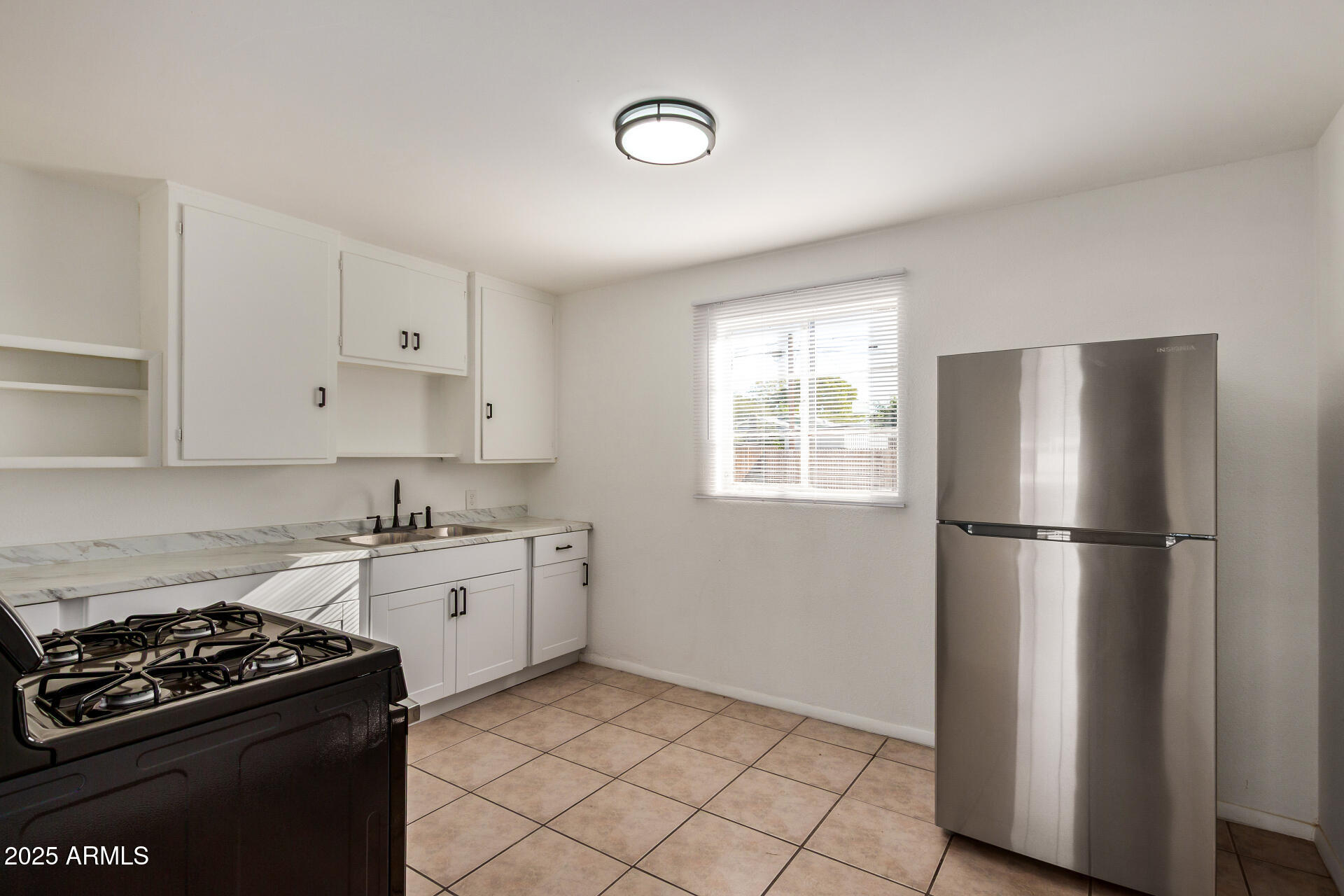 2009 E CLARENDON Avenue