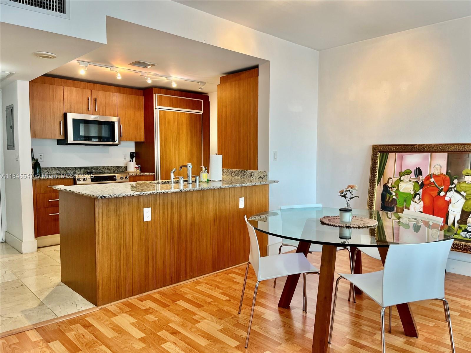 10275 Collins Ave # 716