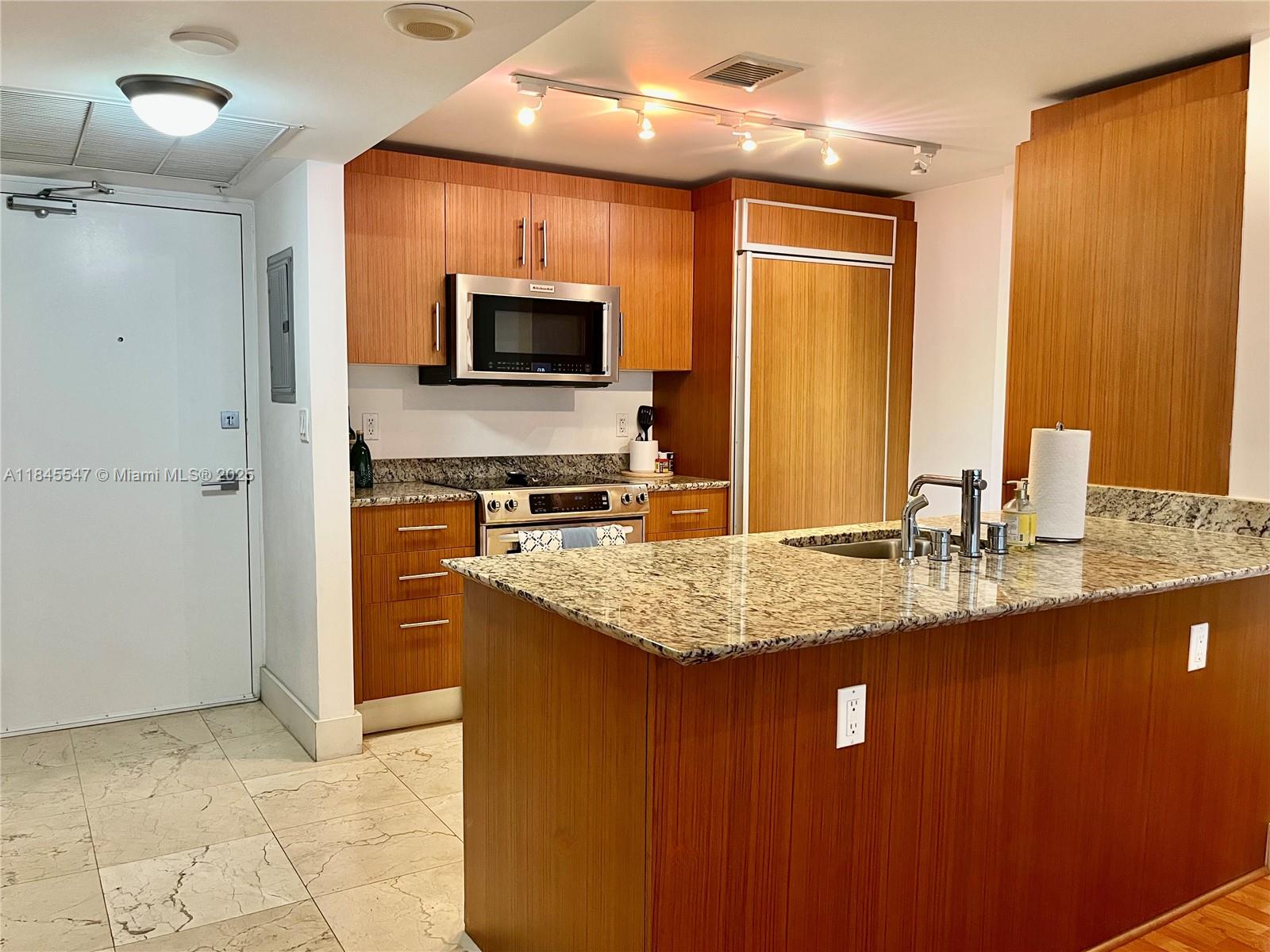 10275 Collins Ave # 716