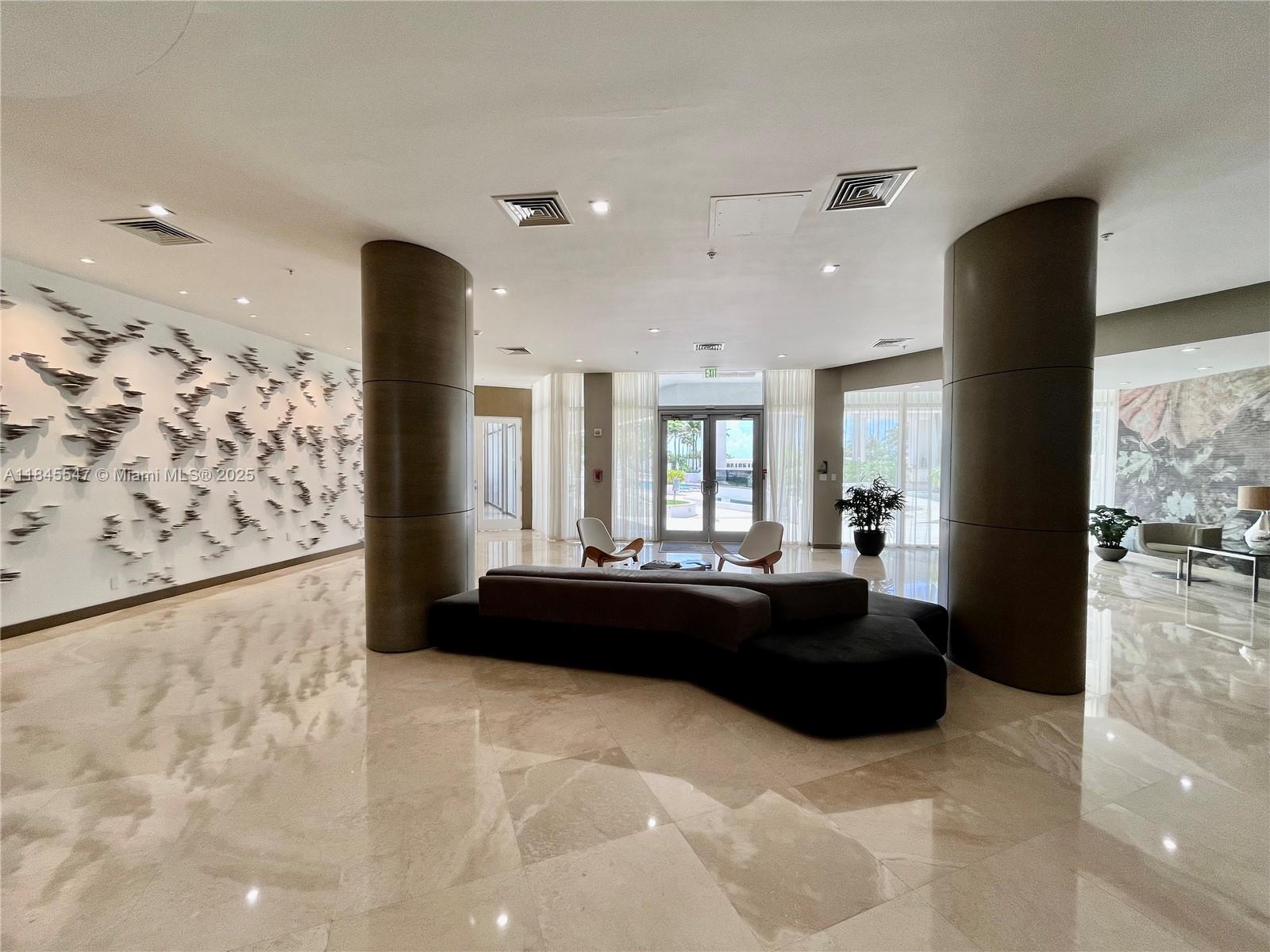 10275 Collins Ave # 716
