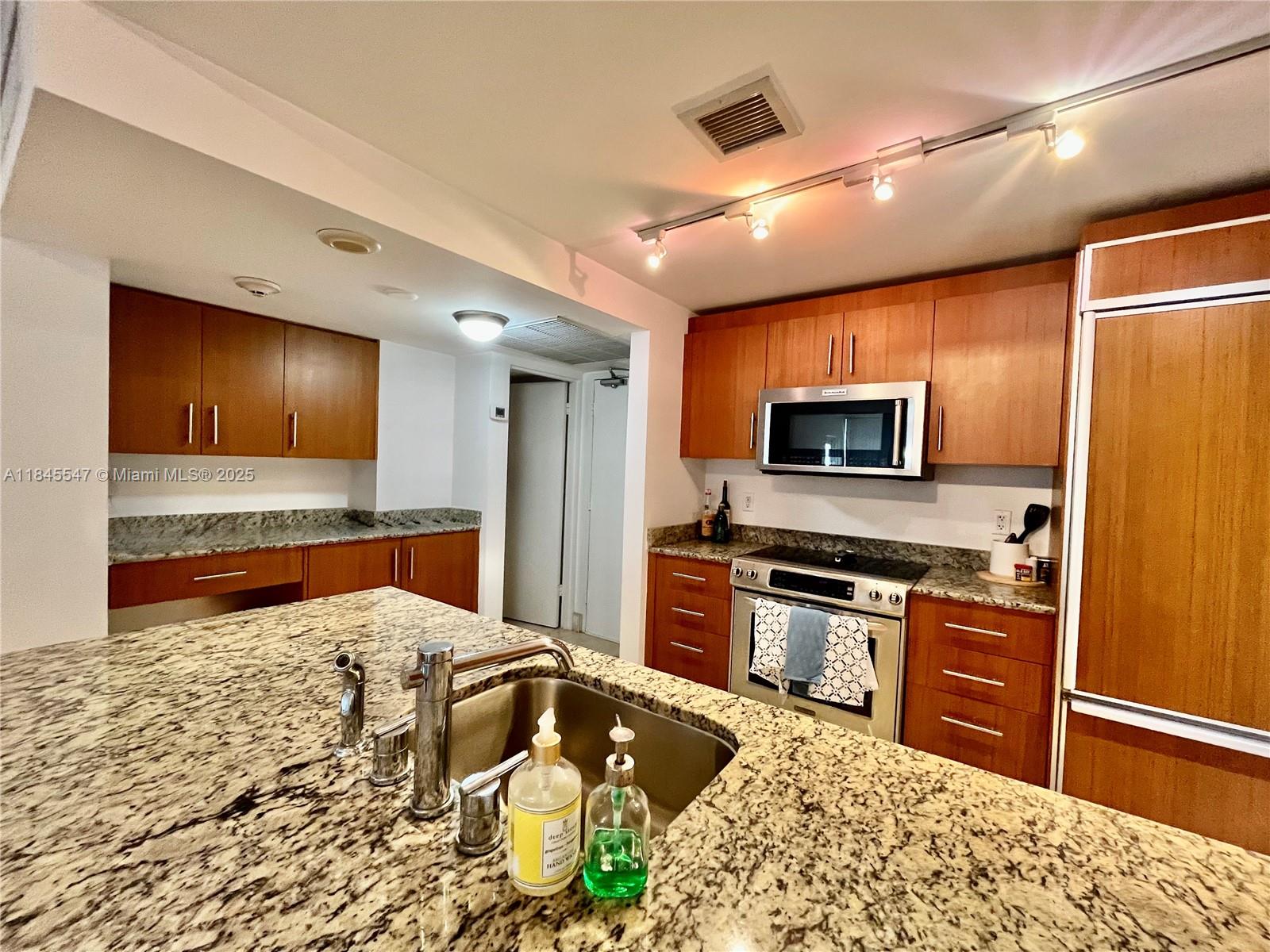 10275 Collins Ave # 716