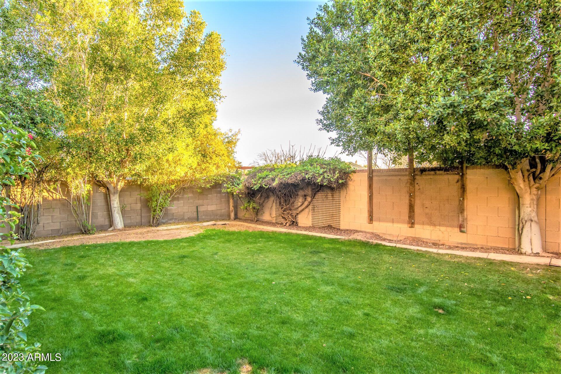 1721 E WOODSMAN Place